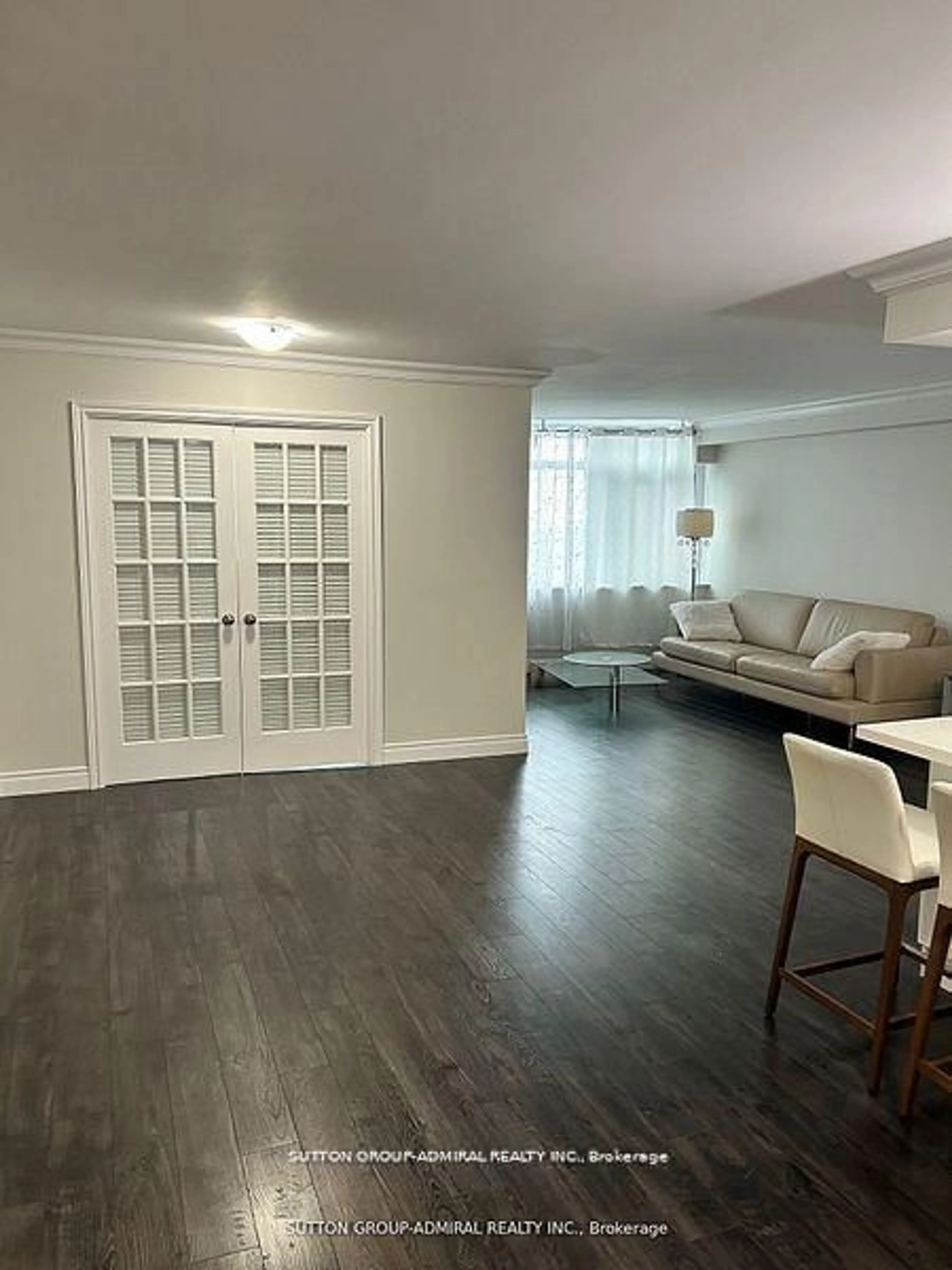 Living room with furniture, wood/laminate floor for 90 FISHERVILLE Rd #1101, Toronto Ontario M2R 3J9