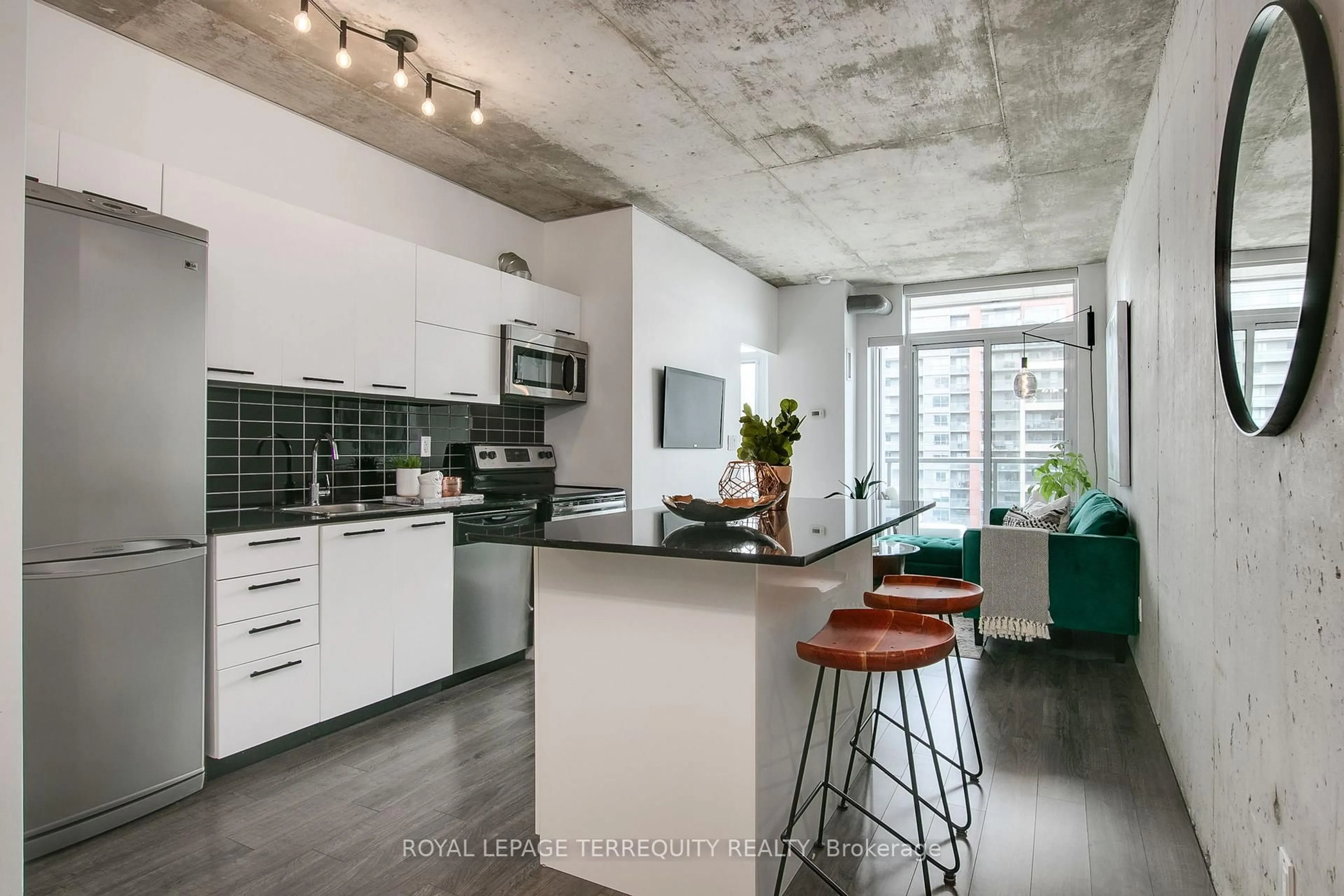 Open concept kitchen, cement floor for 150 Sudbury St #1014, Toronto Ontario M6J 3S8