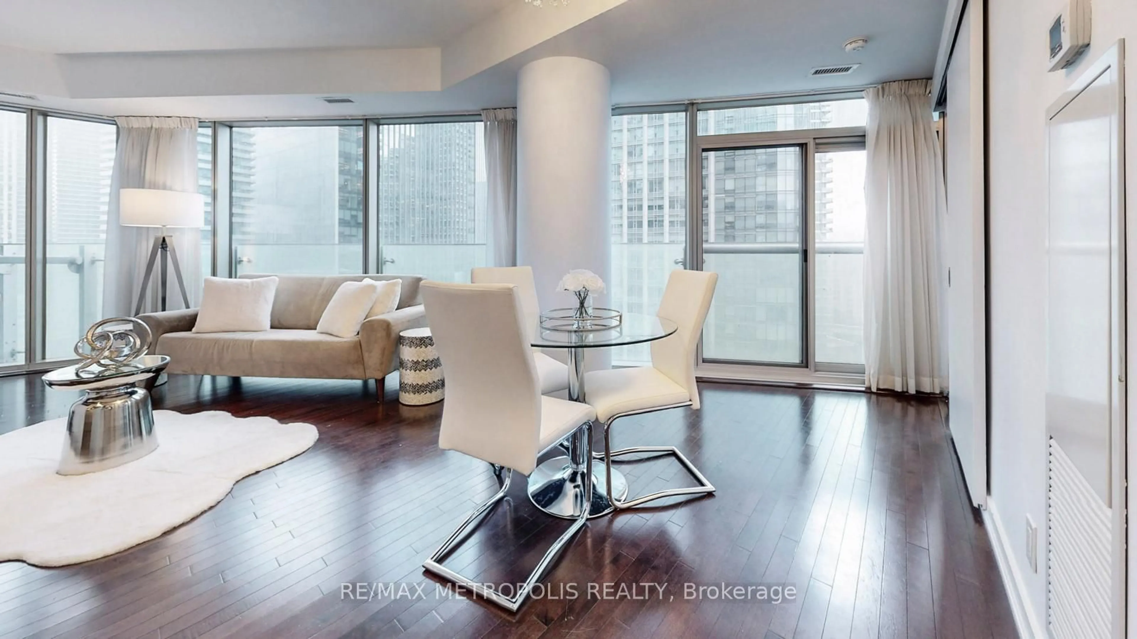 Living room with furniture, wood/laminate floor for 12 York St #1202, Toronto Ontario M5J 0A9