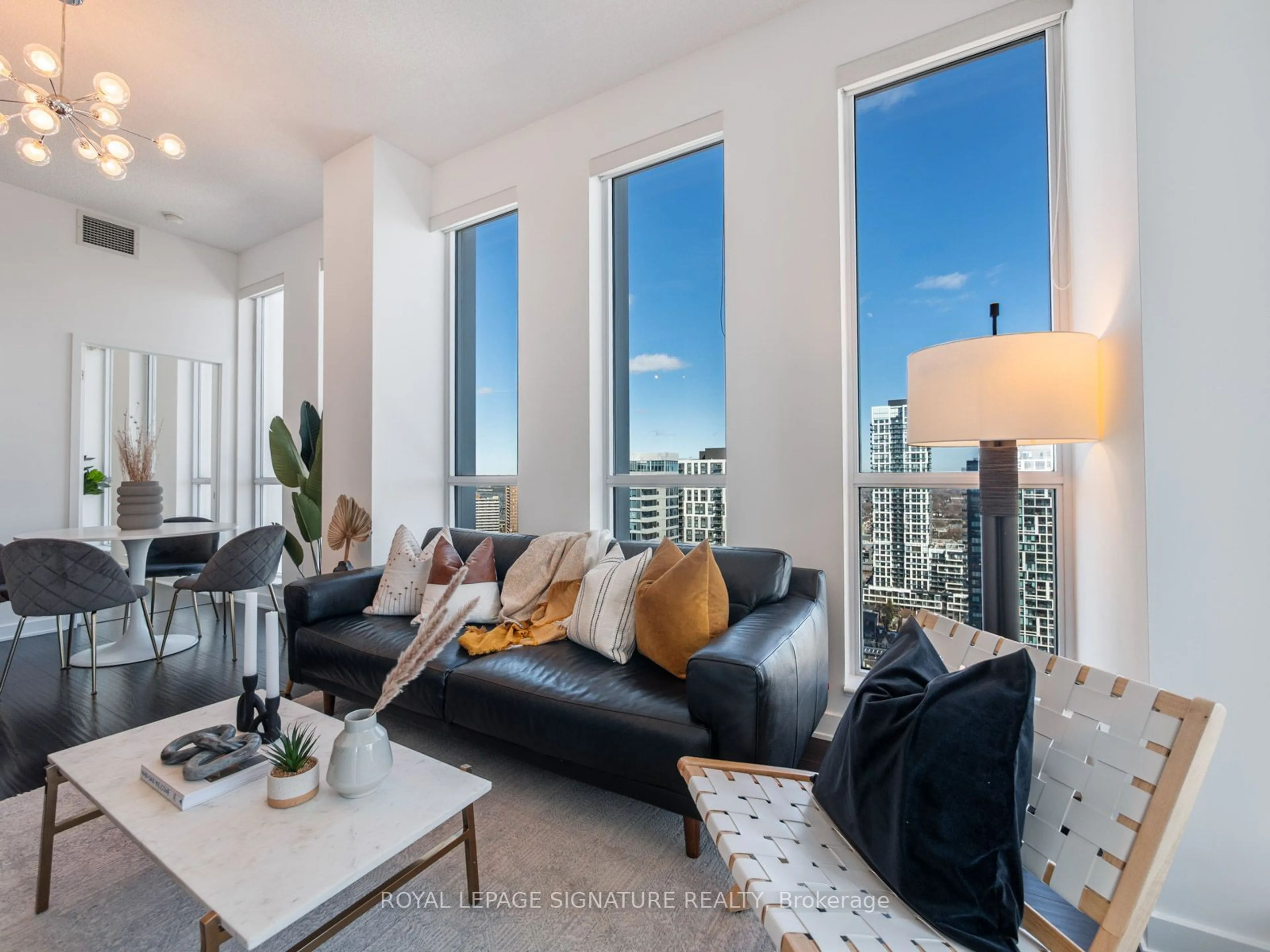 Living room with furniture, unknown for 55 Regent Park Blvd #2802, Toronto Ontario M5A 0C2