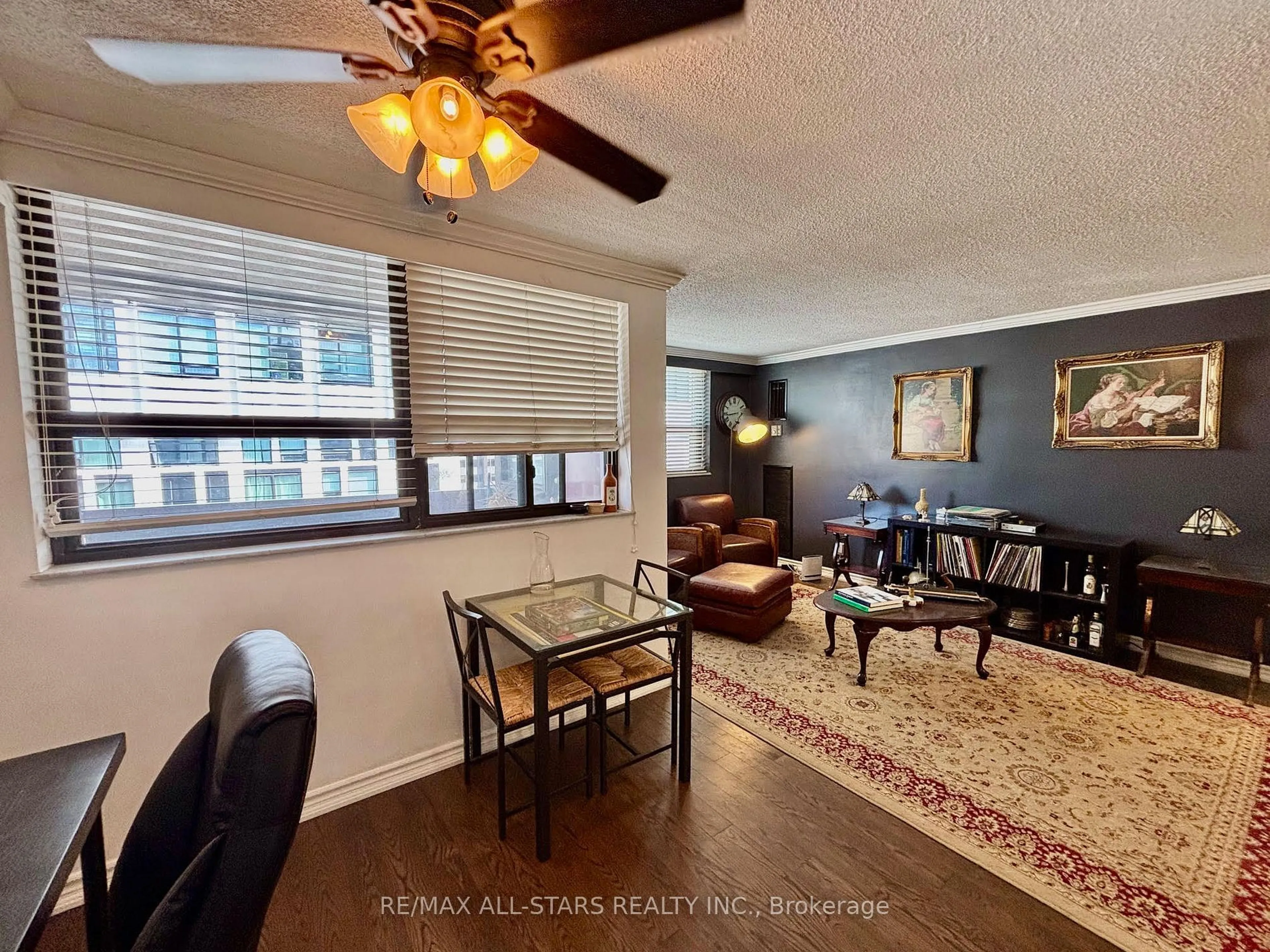 Living room with furniture, wood/laminate floor for 120 Saint Patrick St #1210, Toronto Ontario M5T 2X7