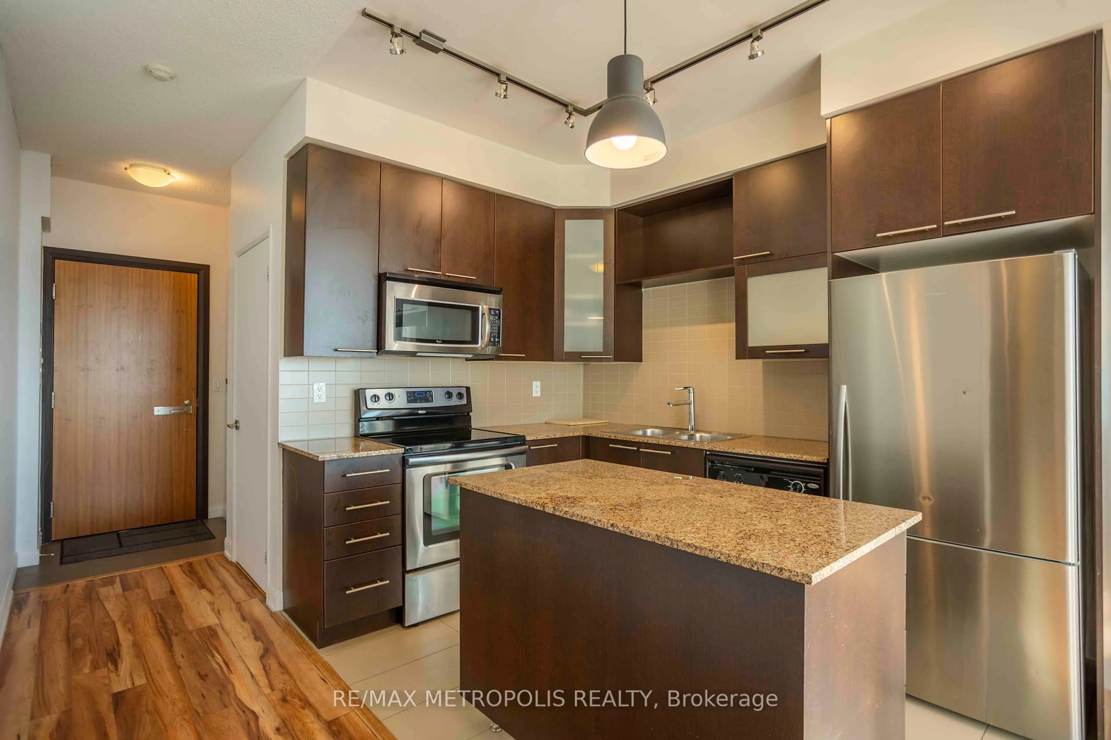 Open concept kitchen, wood/laminate floor for 500 Sherbourne St #1704, Toronto Ontario M4X 1L1