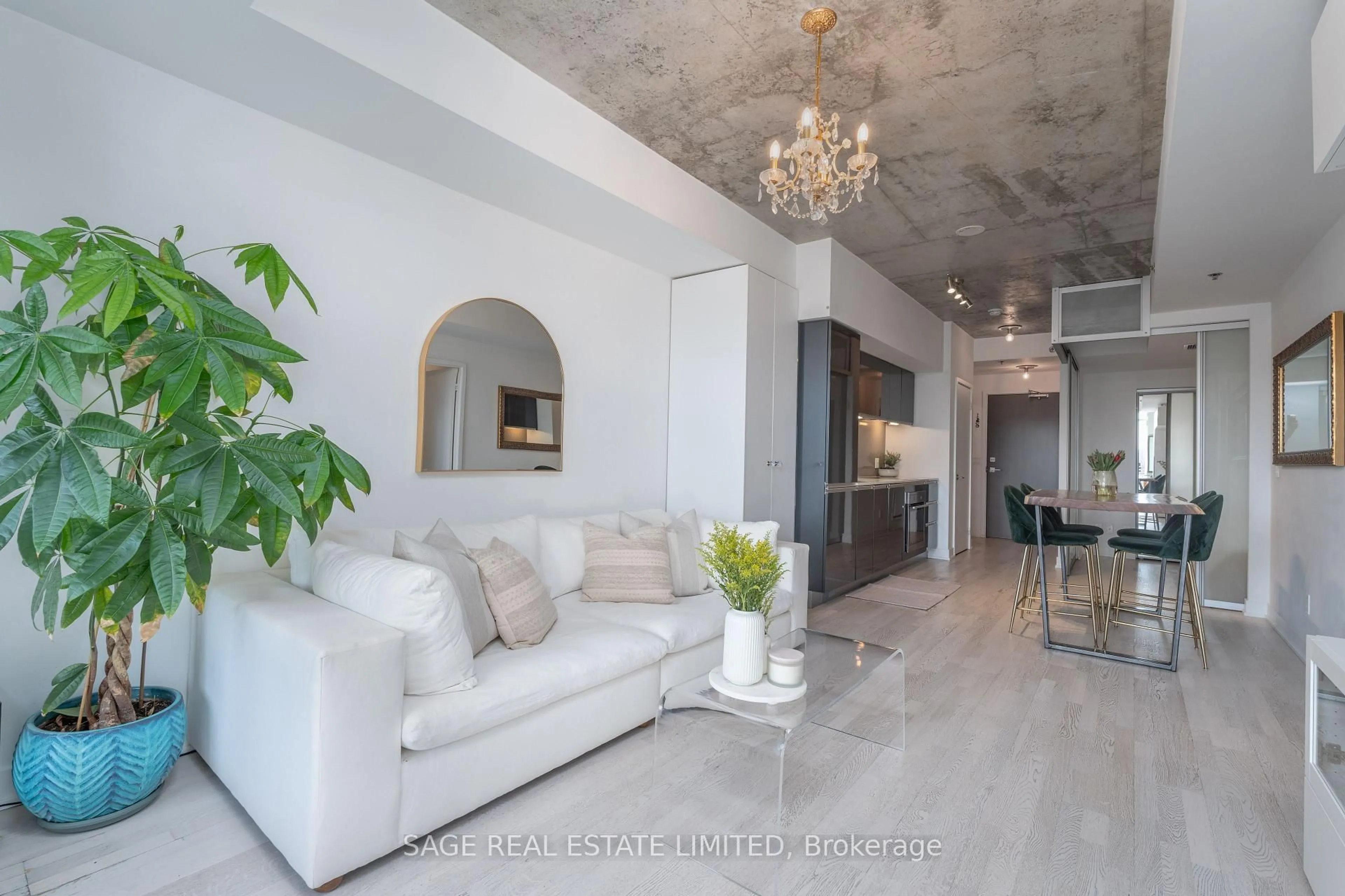 Living room with furniture, cement floor for 20 Gladstone Ave #407, Toronto Ontario M6J 0E9