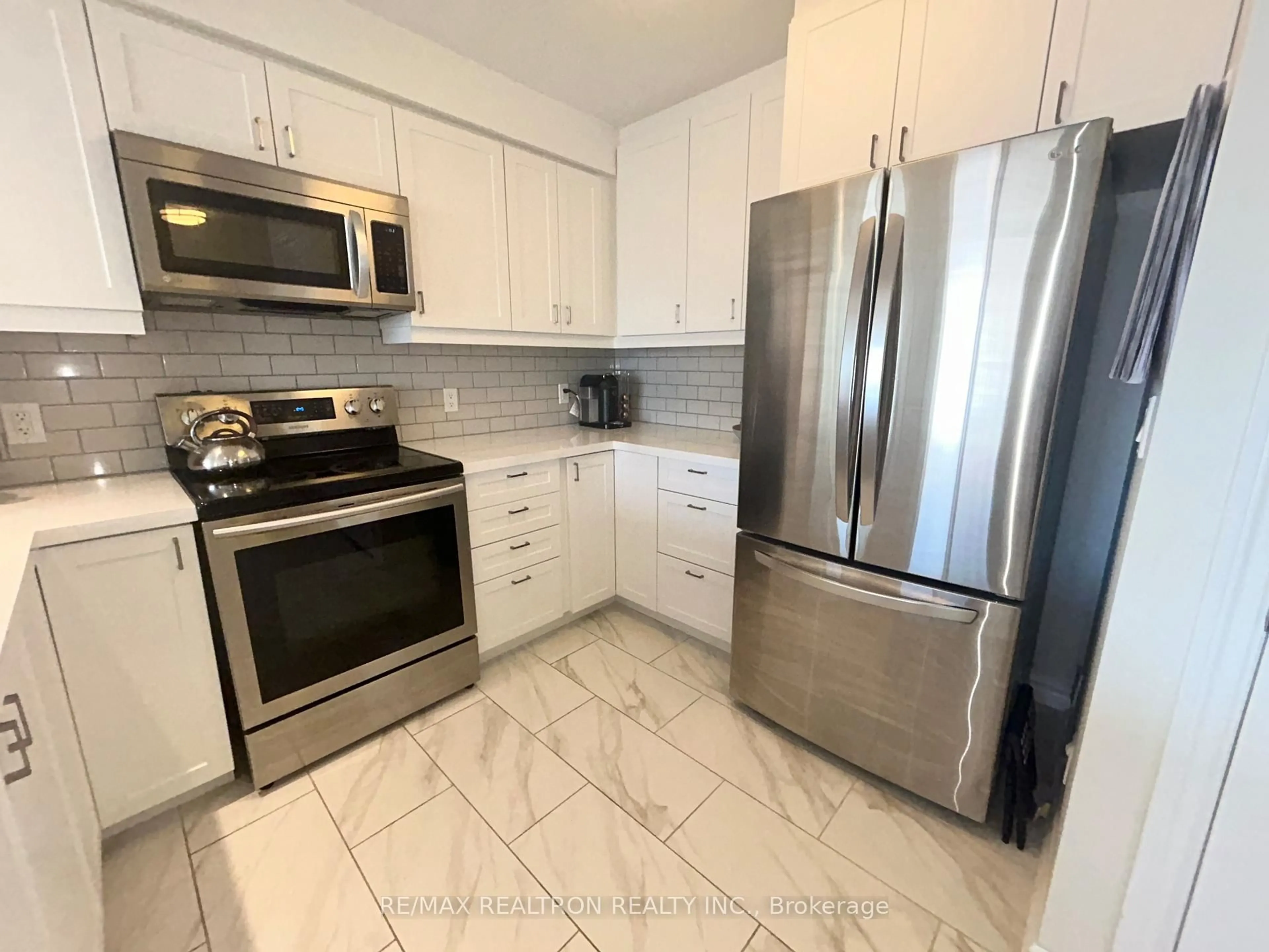 Standard kitchen, ceramic/tile floor for 16 Dallimore Circ #414, Toronto Ontario M3C 4C4