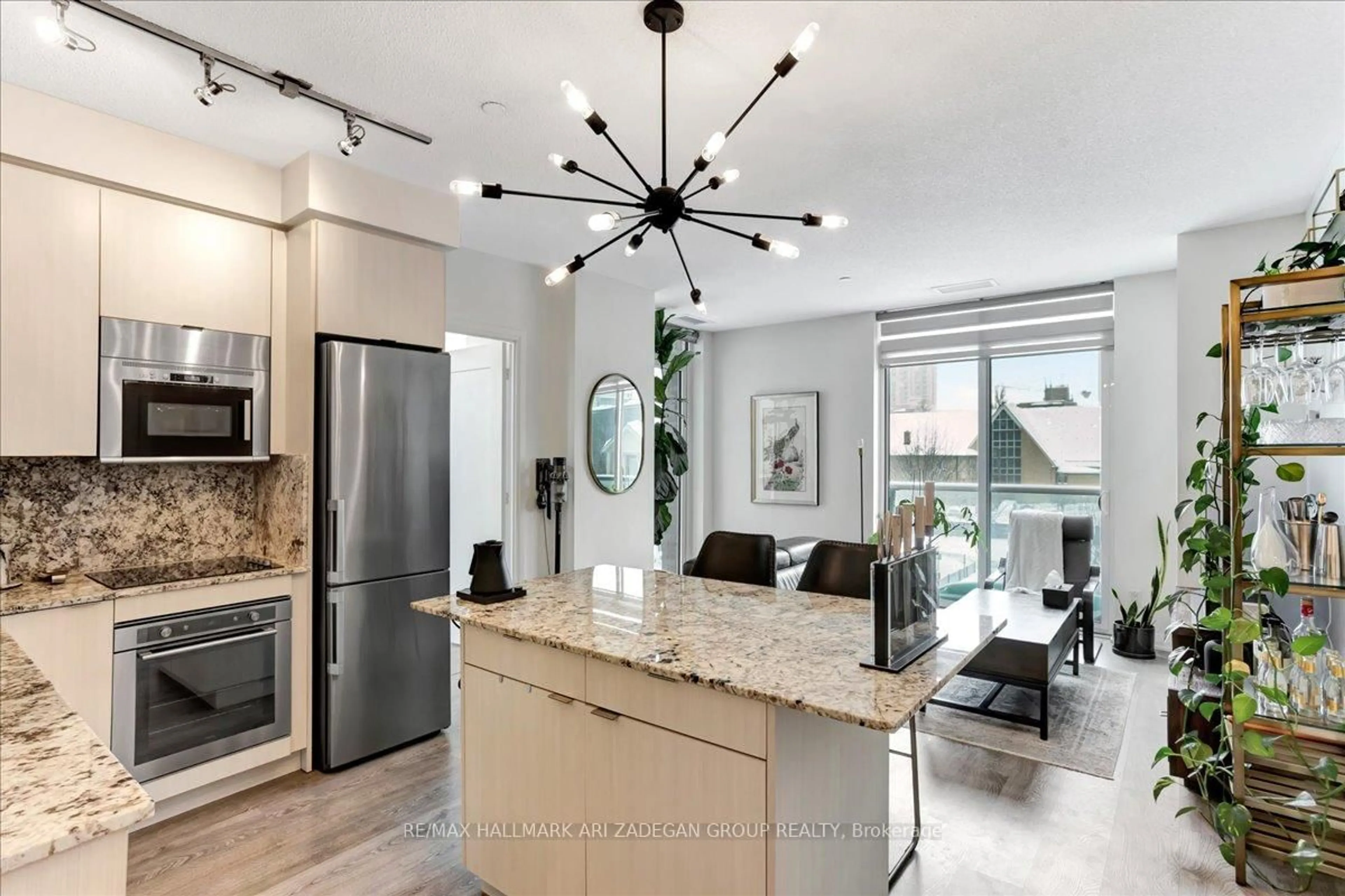 Open concept kitchen, unknown for 101 Erskine Ave #310, Toronto Ontario M4P 1Y5