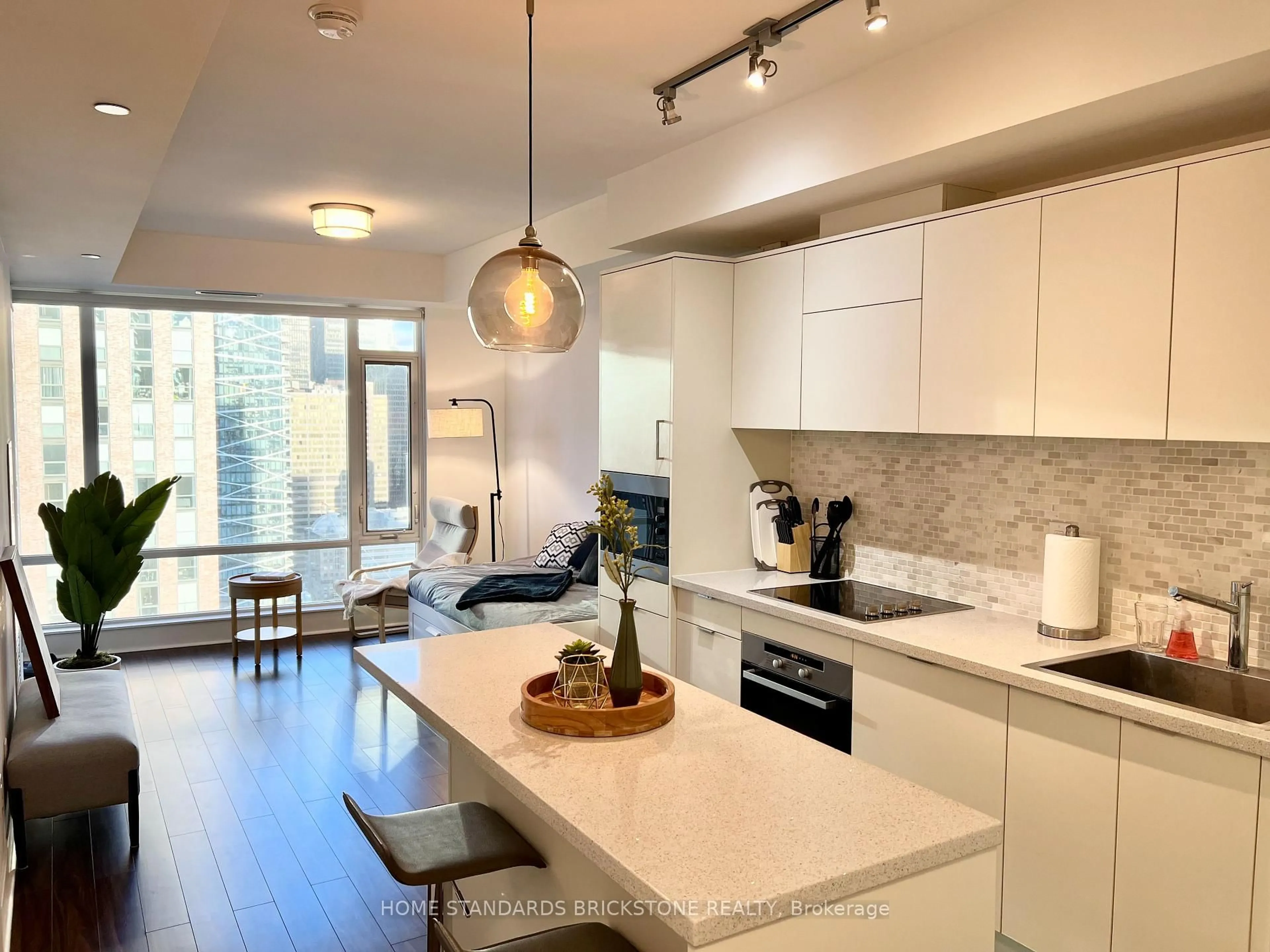 Open concept kitchen, wood/laminate floor for 21 Widmer St #2908, Toronto Ontario M5V 0B8