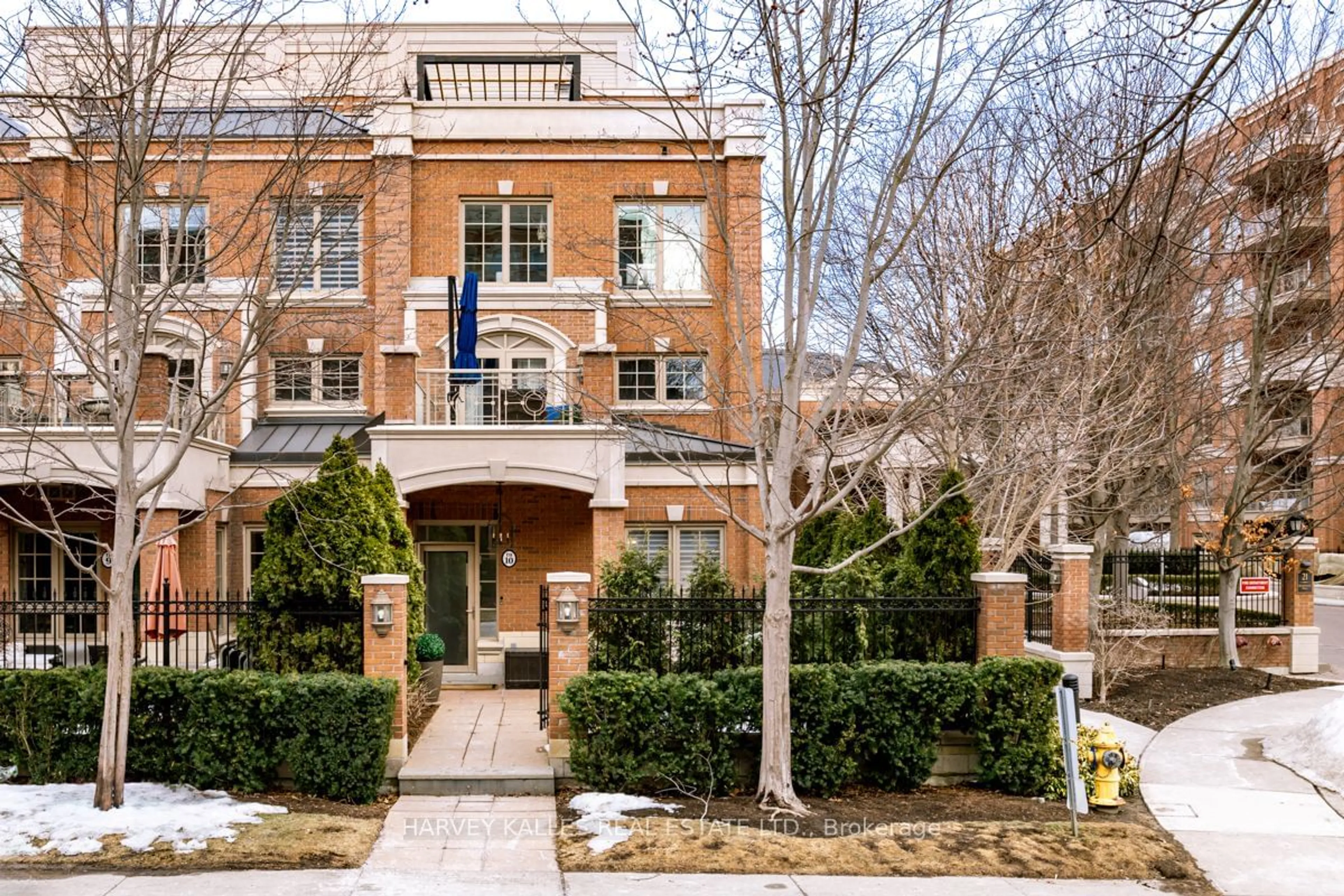 Home with brick exterior material, street for 21 Burkebrook Pl #Th10, Toronto Ontario M4G 0A1