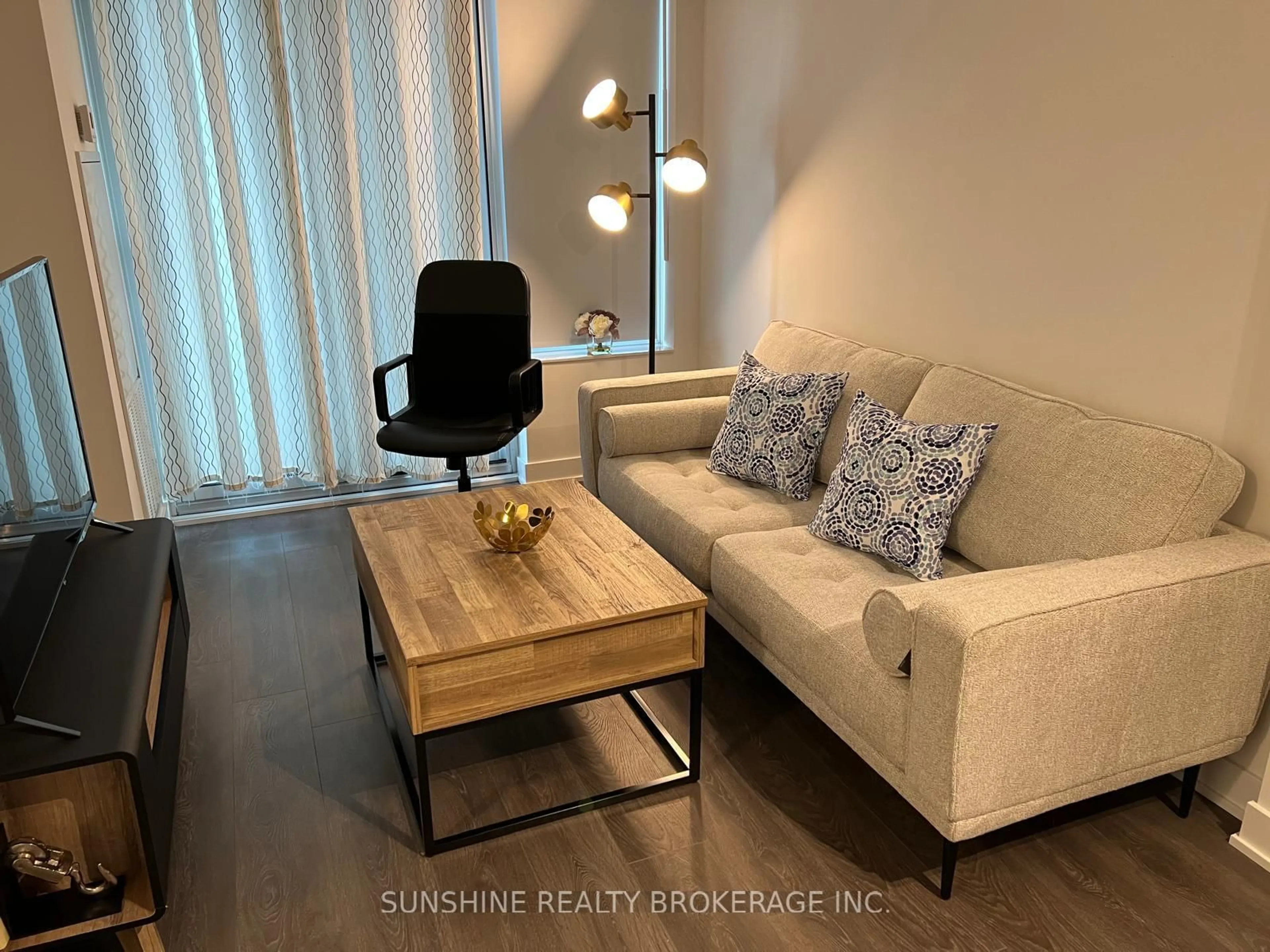 Living room with furniture, wood/laminate floor for 99 Broadway Ave #1607, Toronto Ontario M4P 0E3