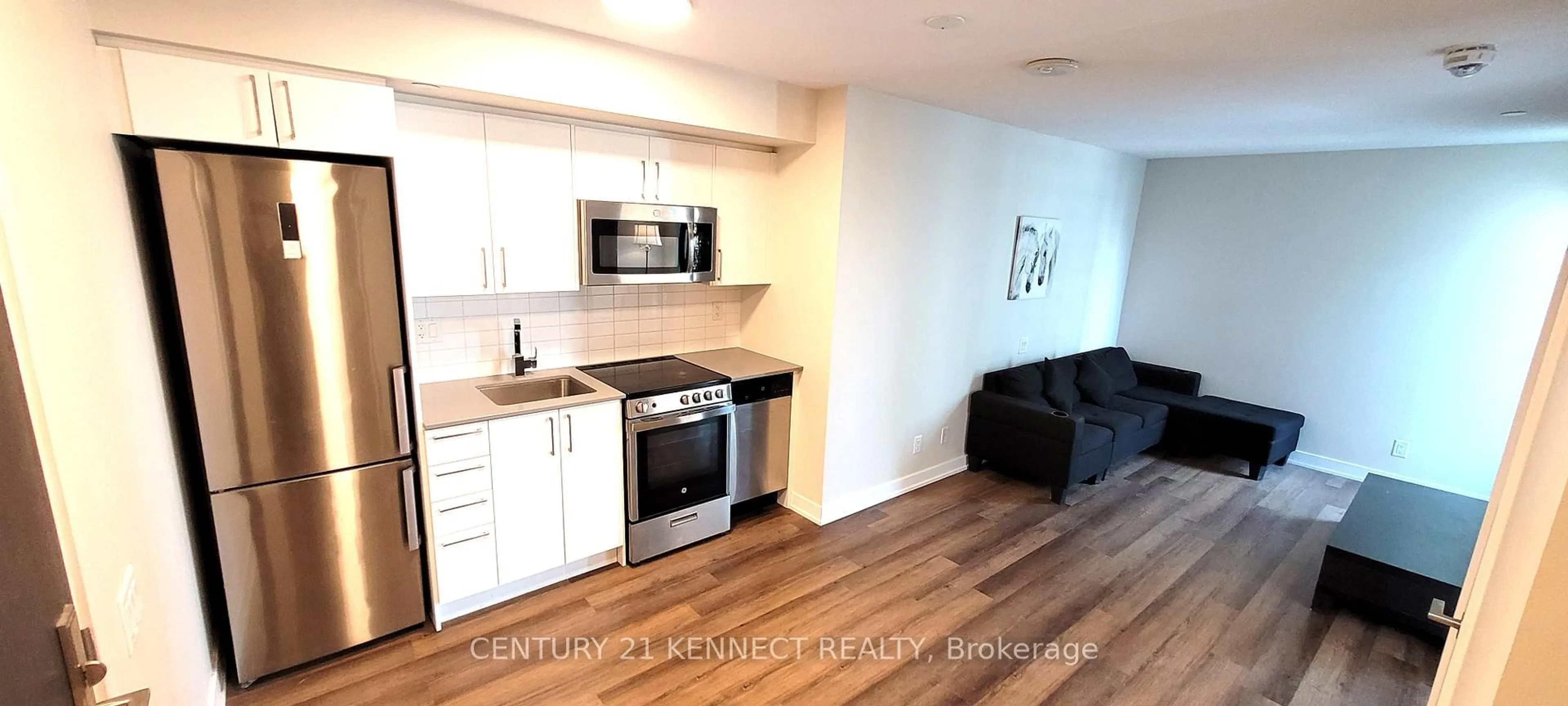 Standard kitchen, wood/laminate floor for 38 Monte Kwinter Crt #701, Toronto Ontario M3H 0E2