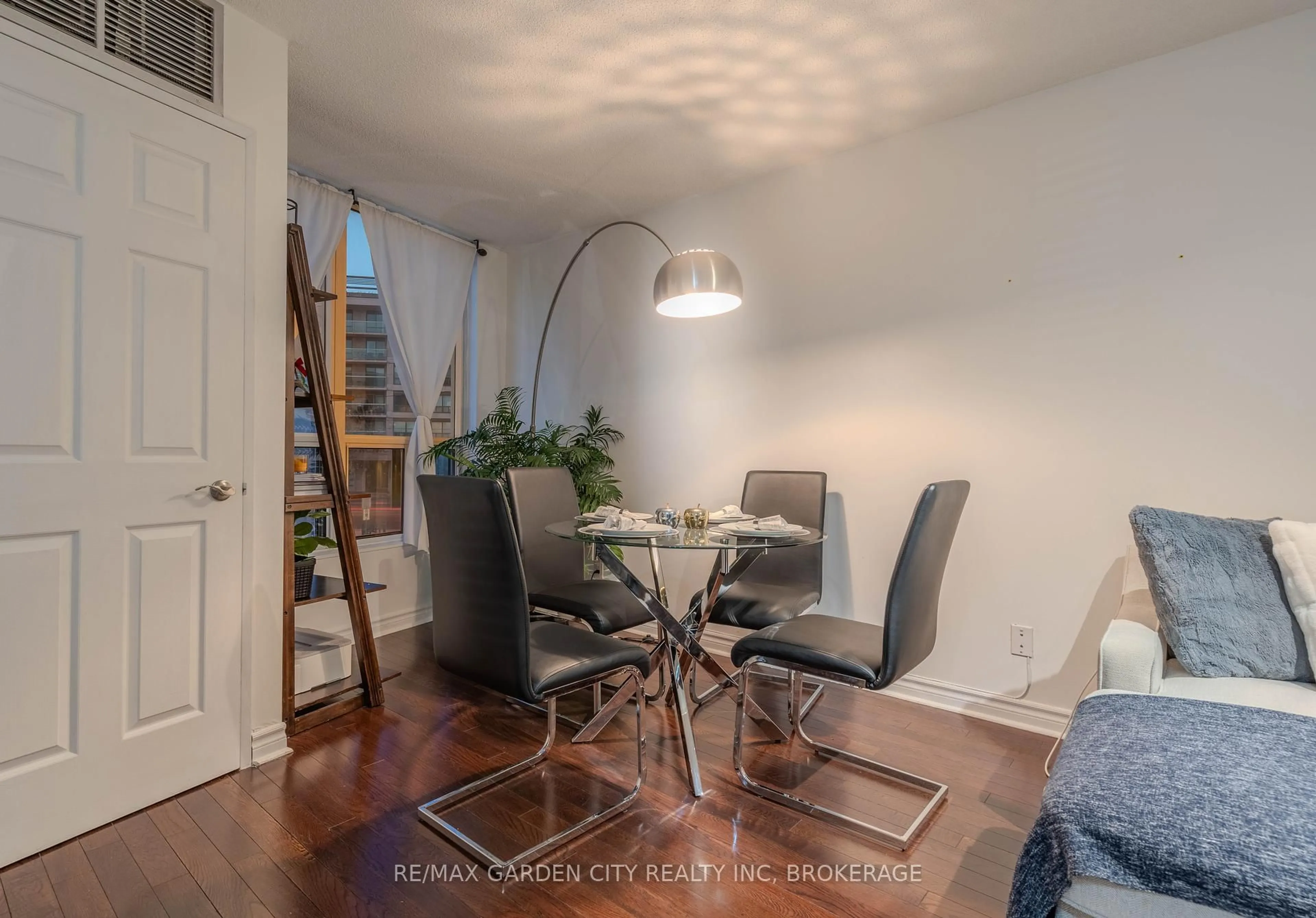 Dining room, wood/laminate floor for 897 Sheppard Ave #202, Toronto Ontario M3H 2T4