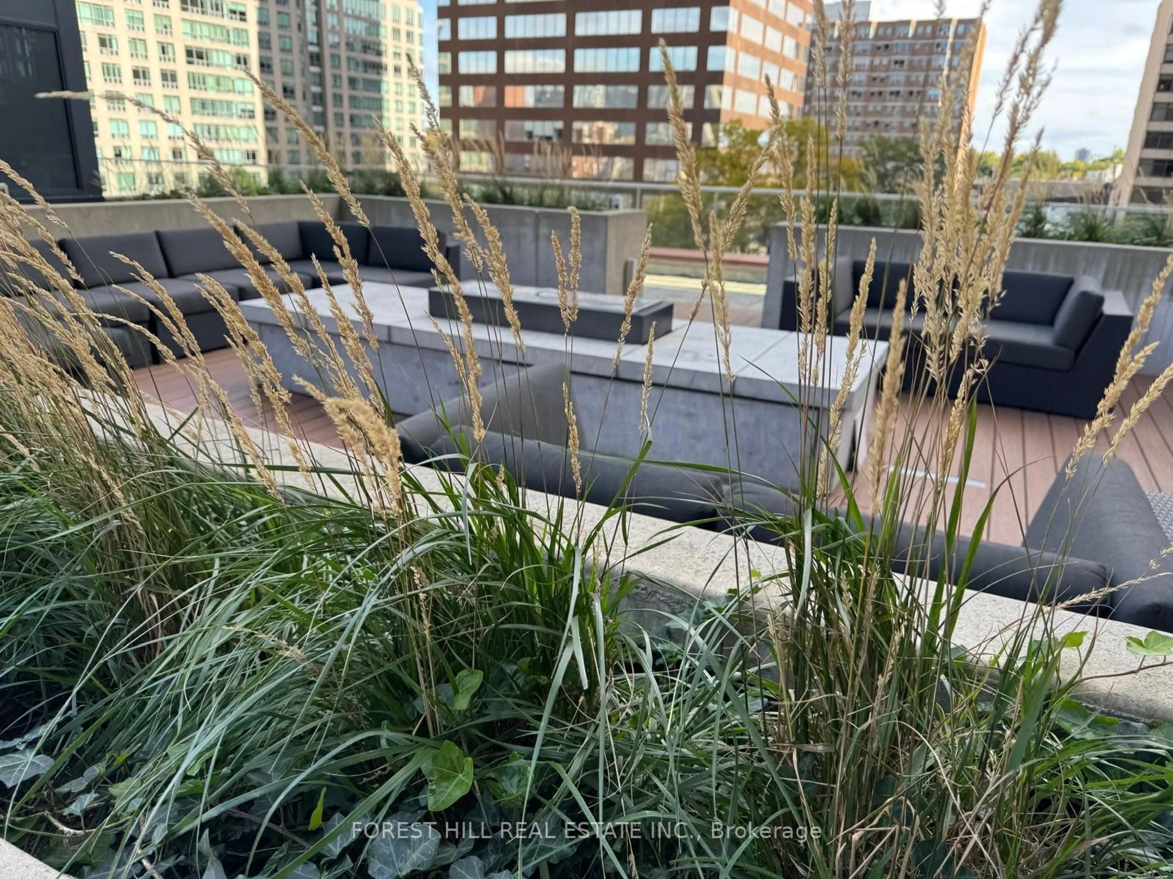 Patio, city buildings view from balcony for 32 Davenport Rd #306, Toronto Ontario M5R 0B5