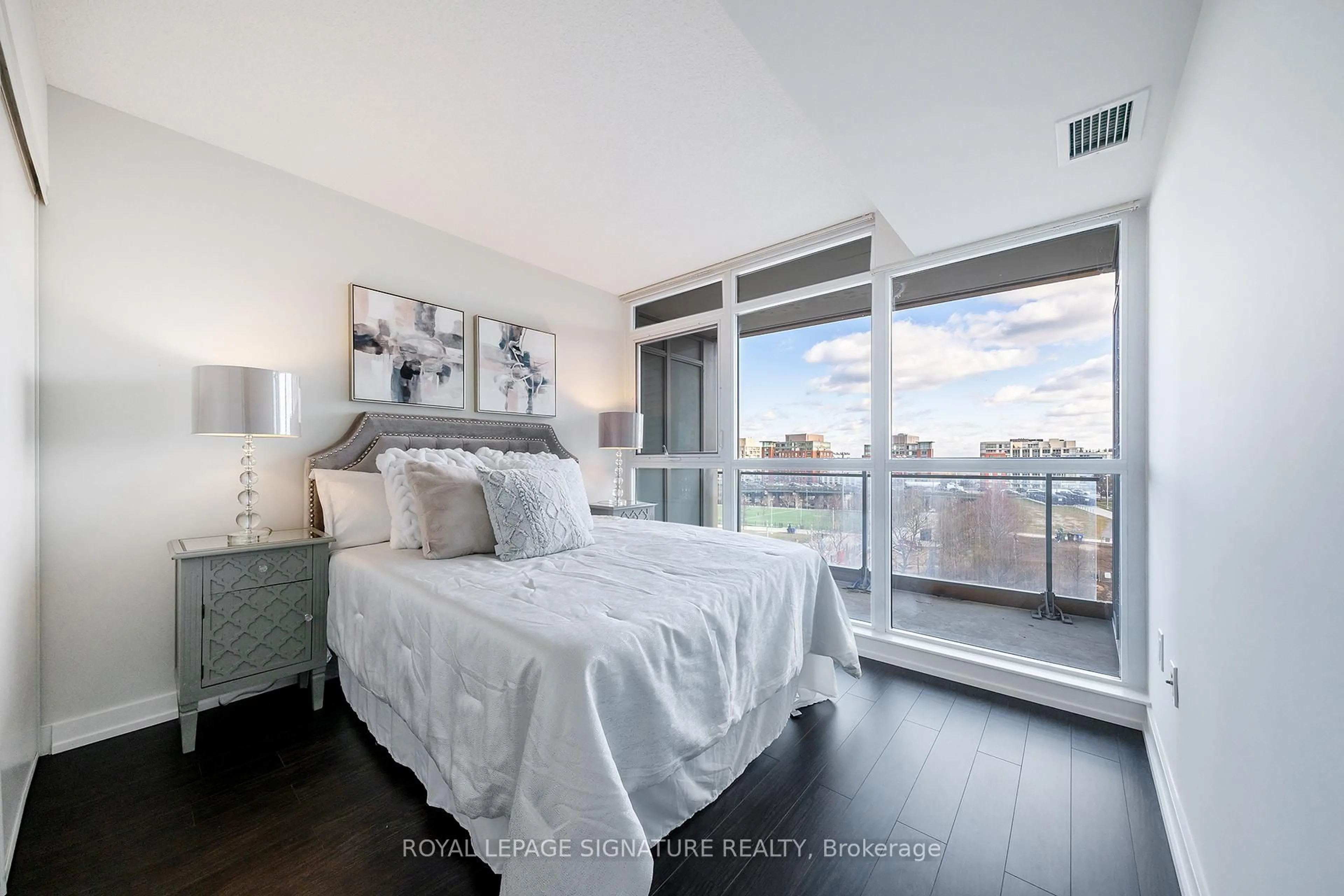 Bedroom with bed, wood/laminate floor for 151 Dan Leckie Way #655, Toronto Ontario M5V 4B2
