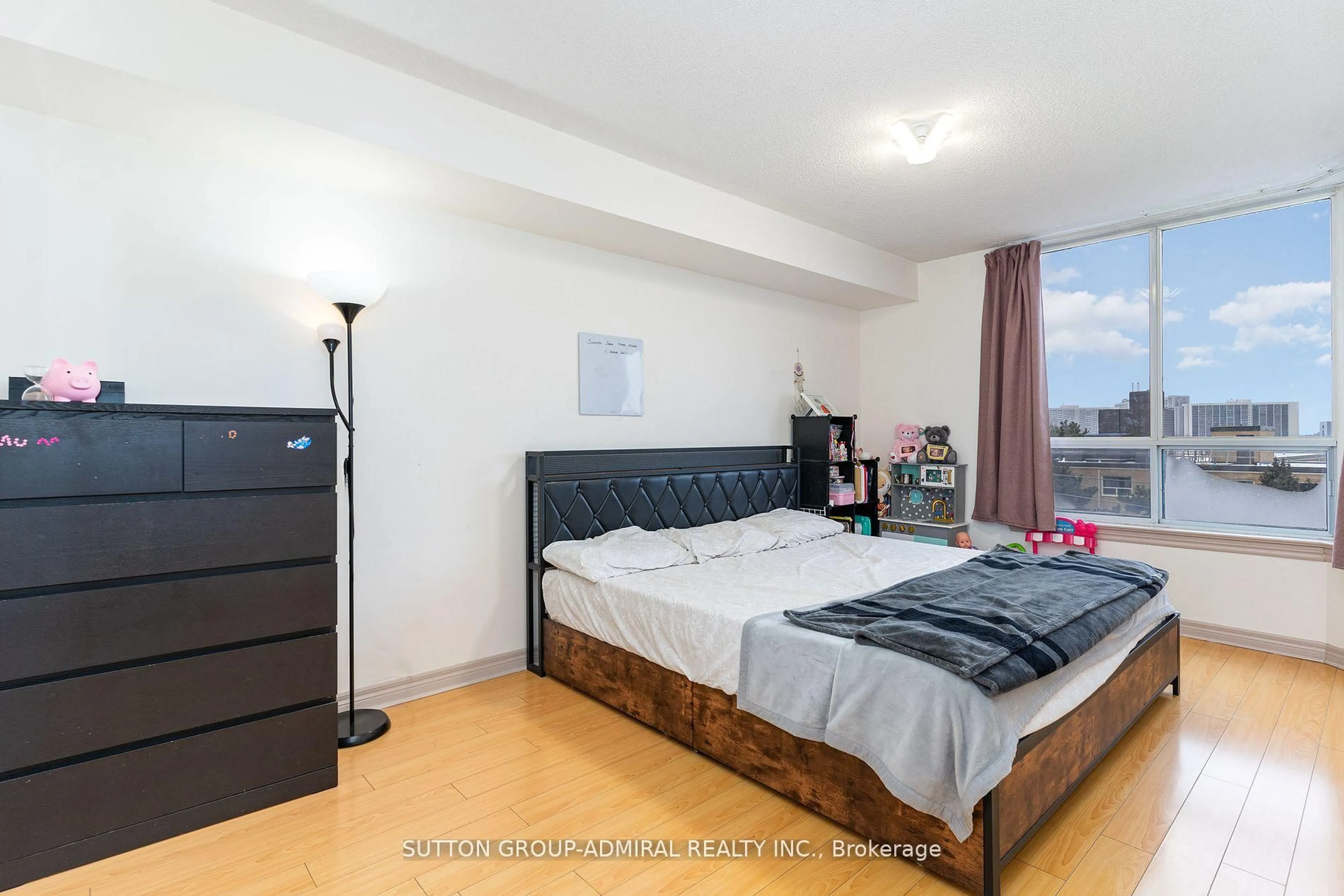 Bedroom with bed, wood/laminate floor for 1700 Eglinton Ave #618, Toronto Ontario M4A 2X4