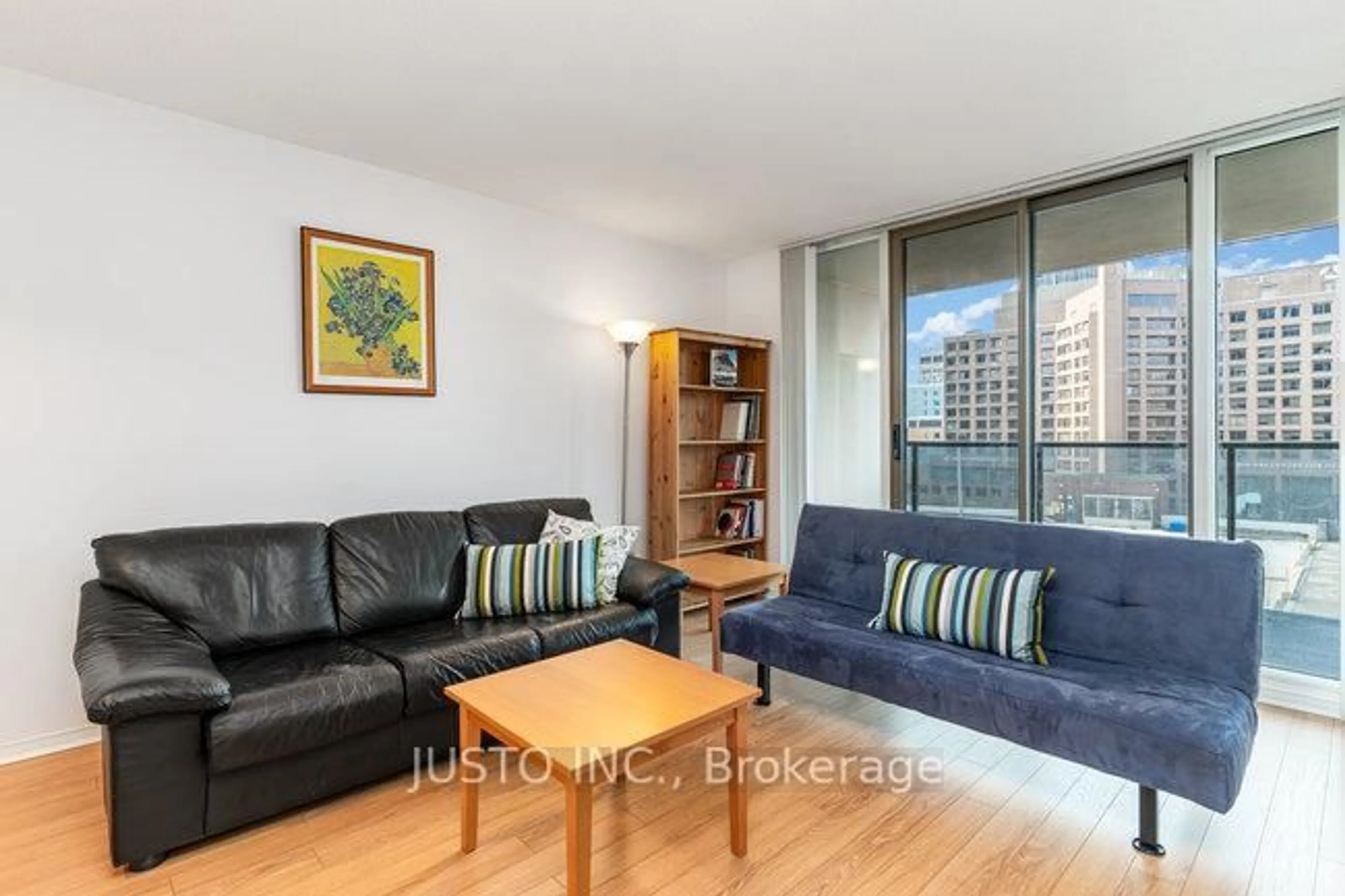 Living room with furniture, wood/laminate floor for 750 Bay St #1108, Toronto Ontario M5G 1N6