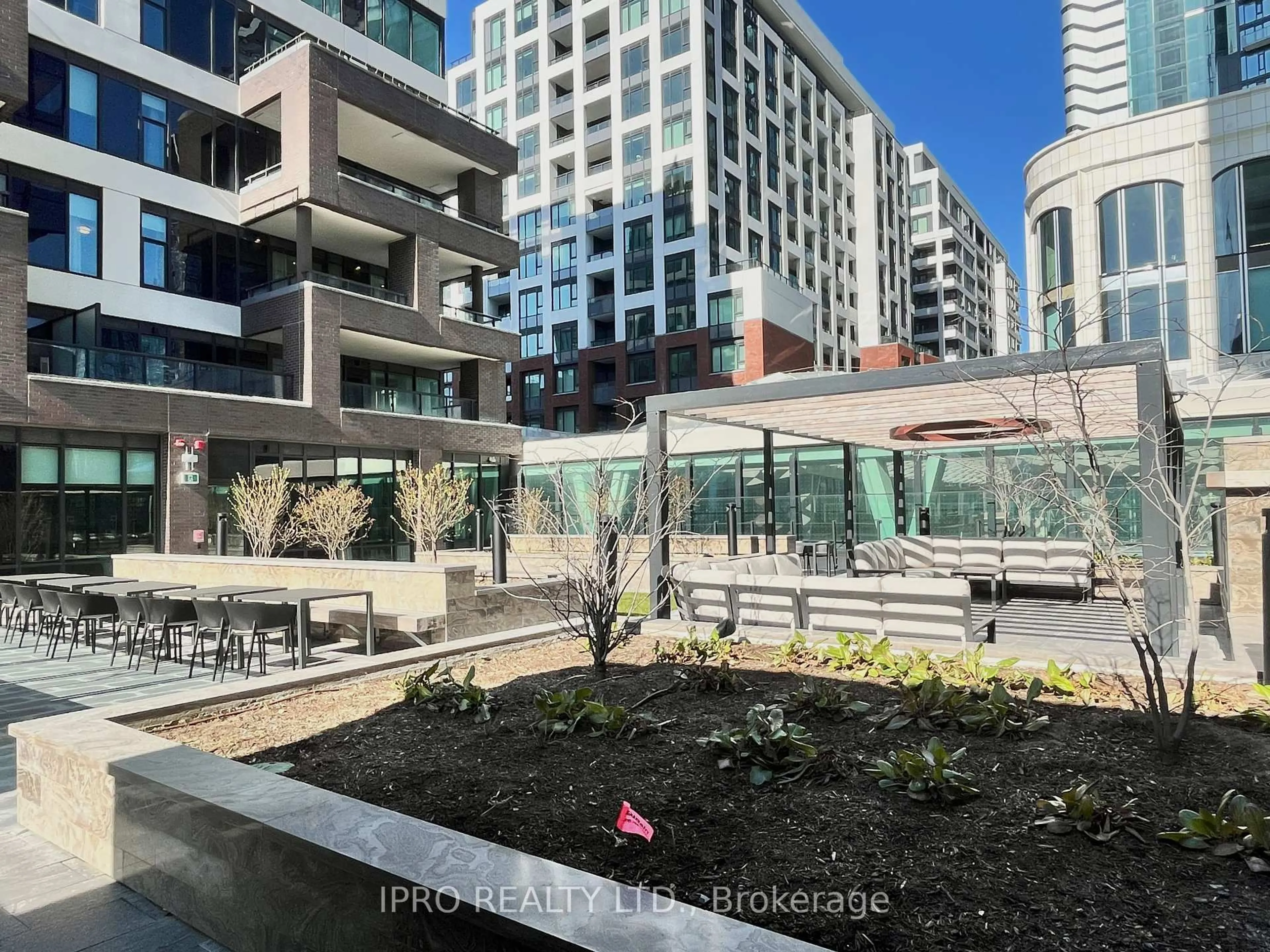 Patio, city buildings view from balcony for 455 Wellington St #1002, Toronto Ontario M5J 2R2