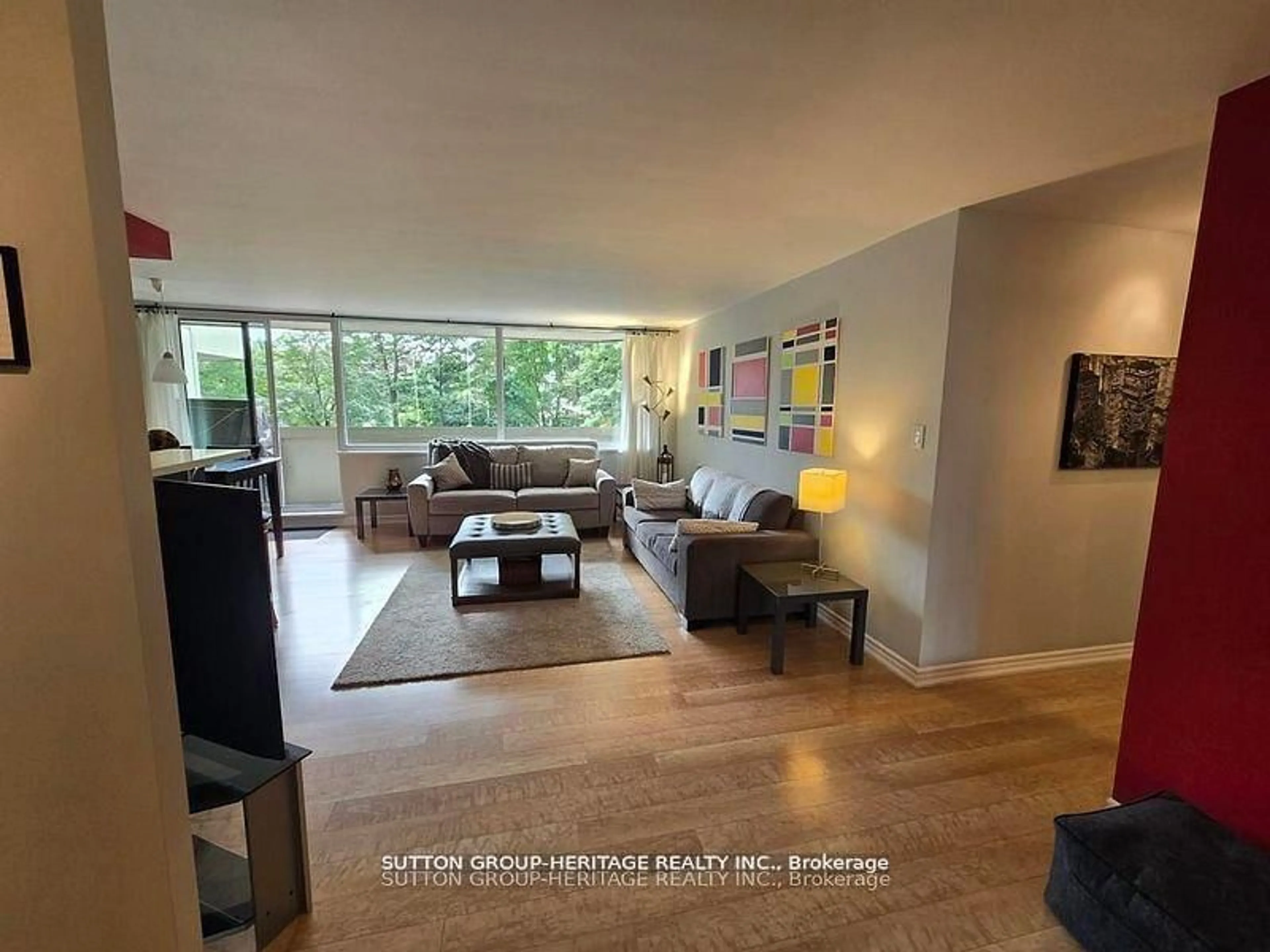 Living room with furniture, unknown for 75 Wynford Heights Cres #201, Toronto Ontario M3C 3H9