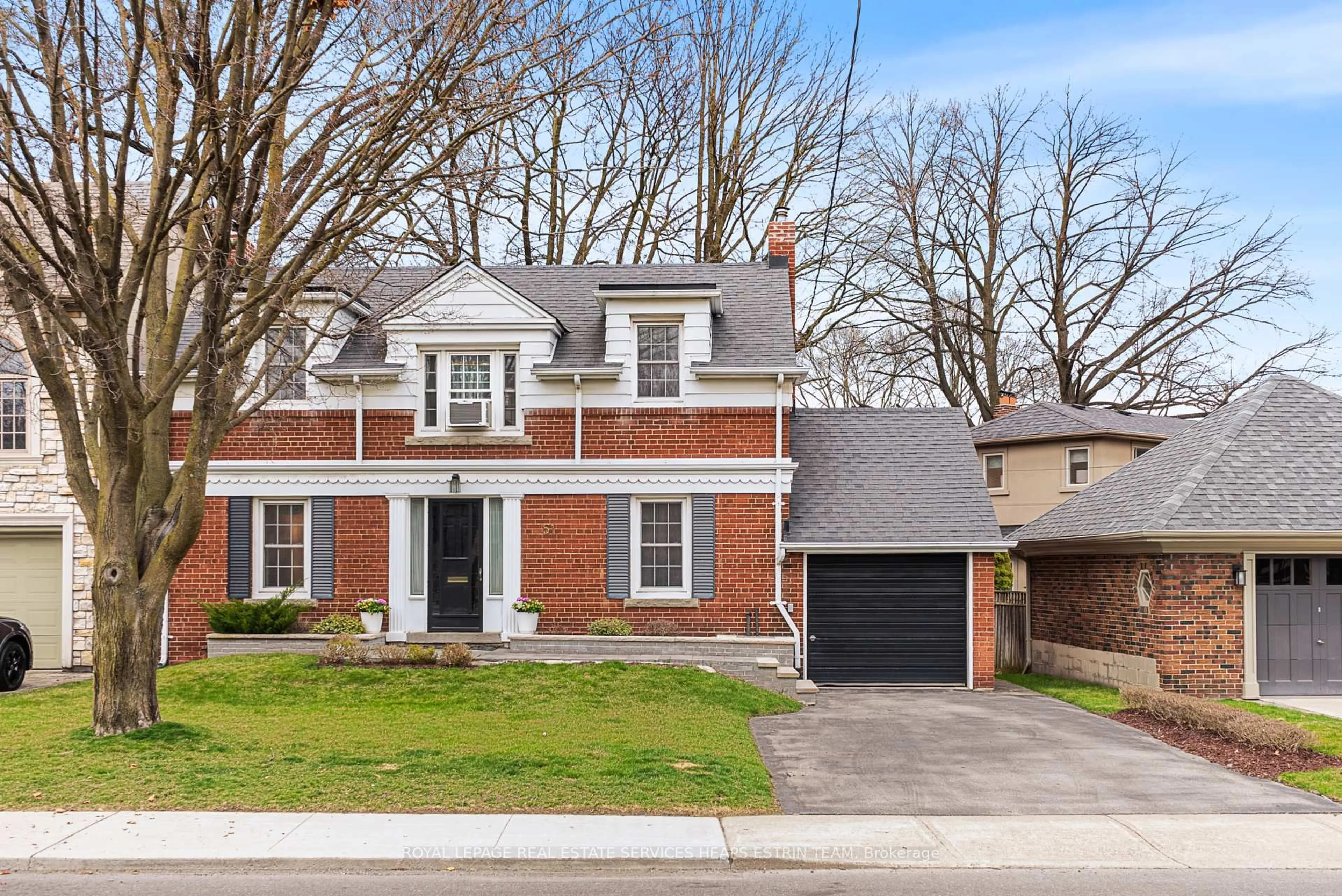 Home with brick exterior material, street for 51 Hanna Rd, Toronto Ontario M4G 3M8