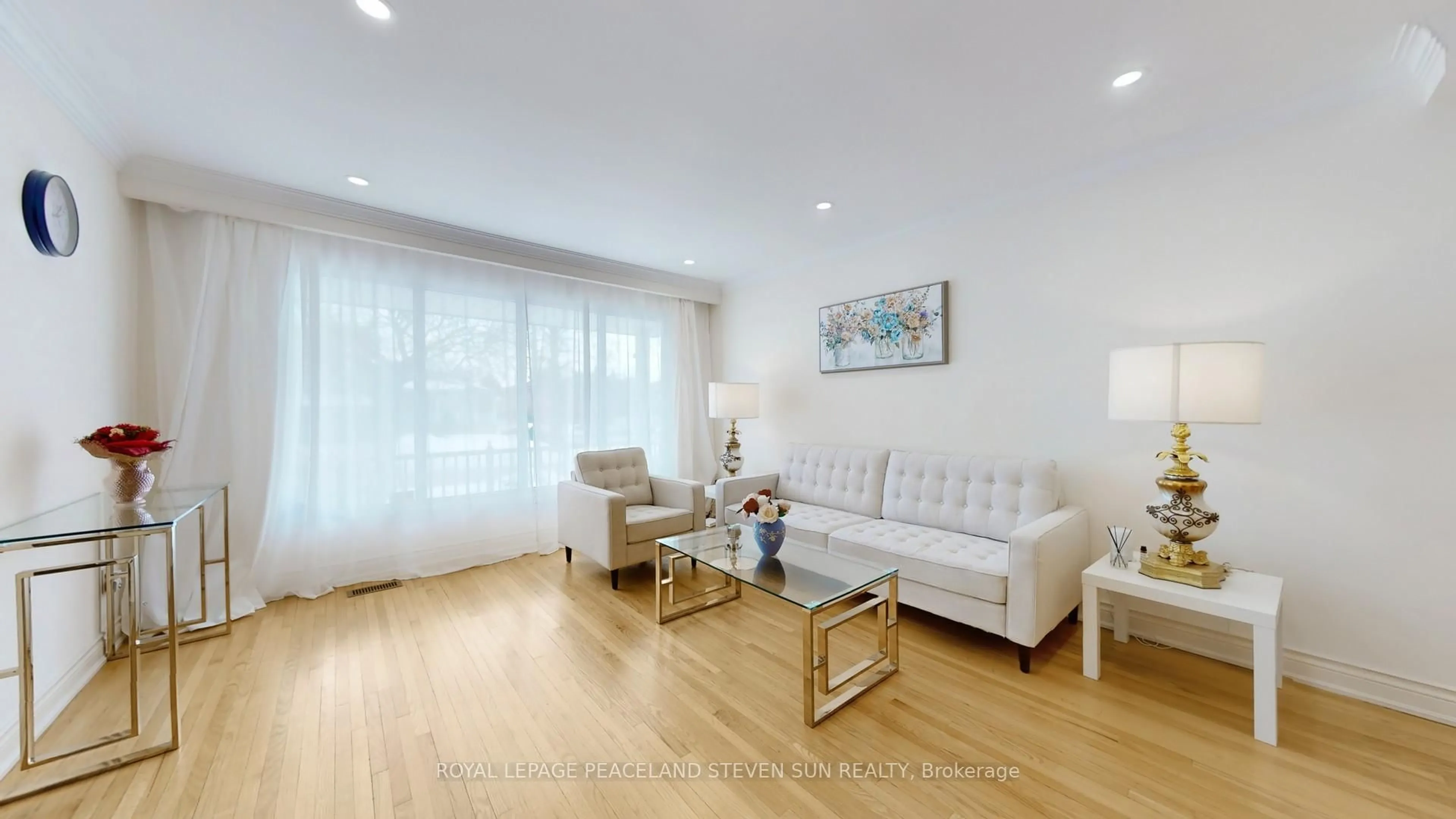 Living room with furniture, wood/laminate floor for 56 Bickerton Cres, Toronto Ontario M2J 3T1