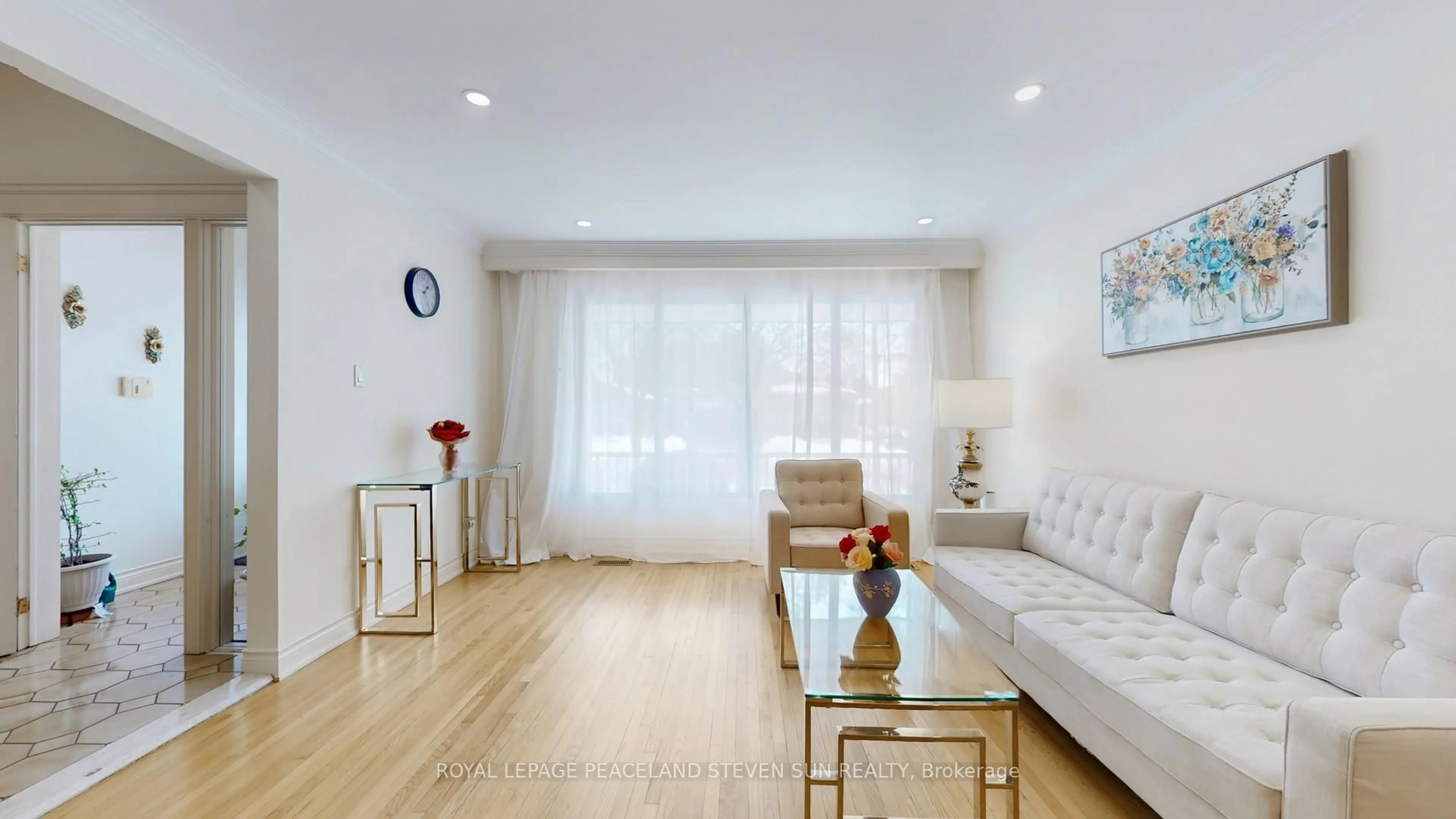 Living room with furniture, wood/laminate floor for 56 Bickerton Cres, Toronto Ontario M2J 3T1
