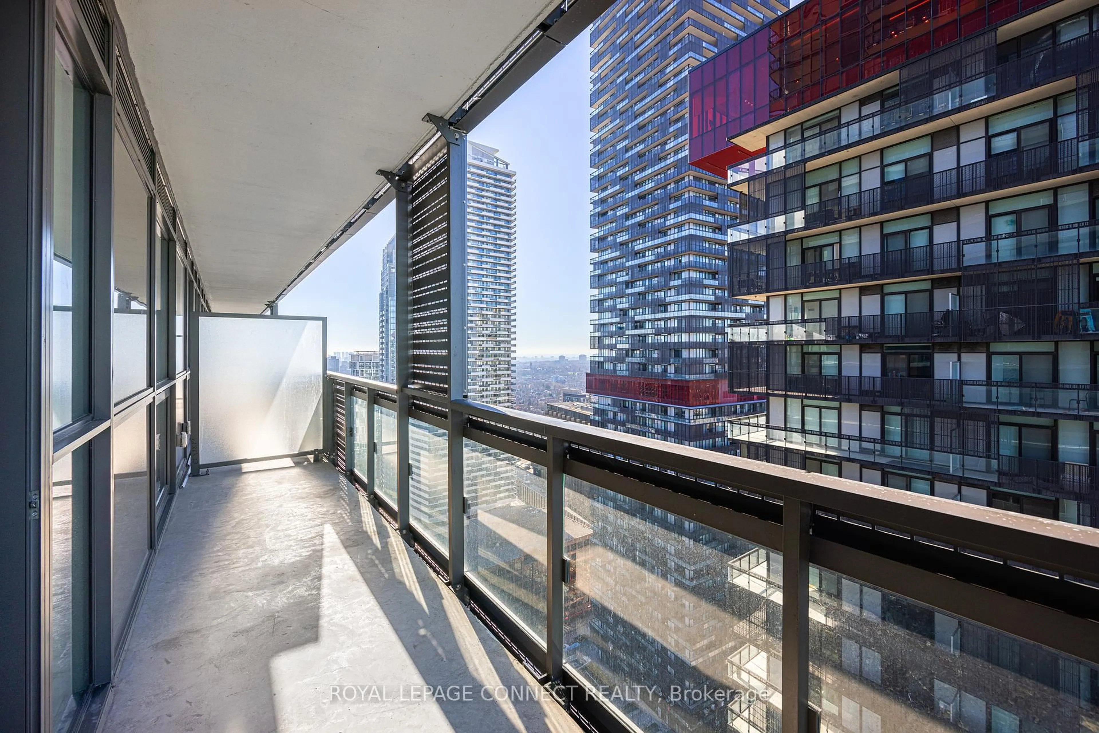 Balcony in the apartment, city buildings view from balcony for 39 Roehampton Ave #2907, Toronto Ontario M4P 0G1