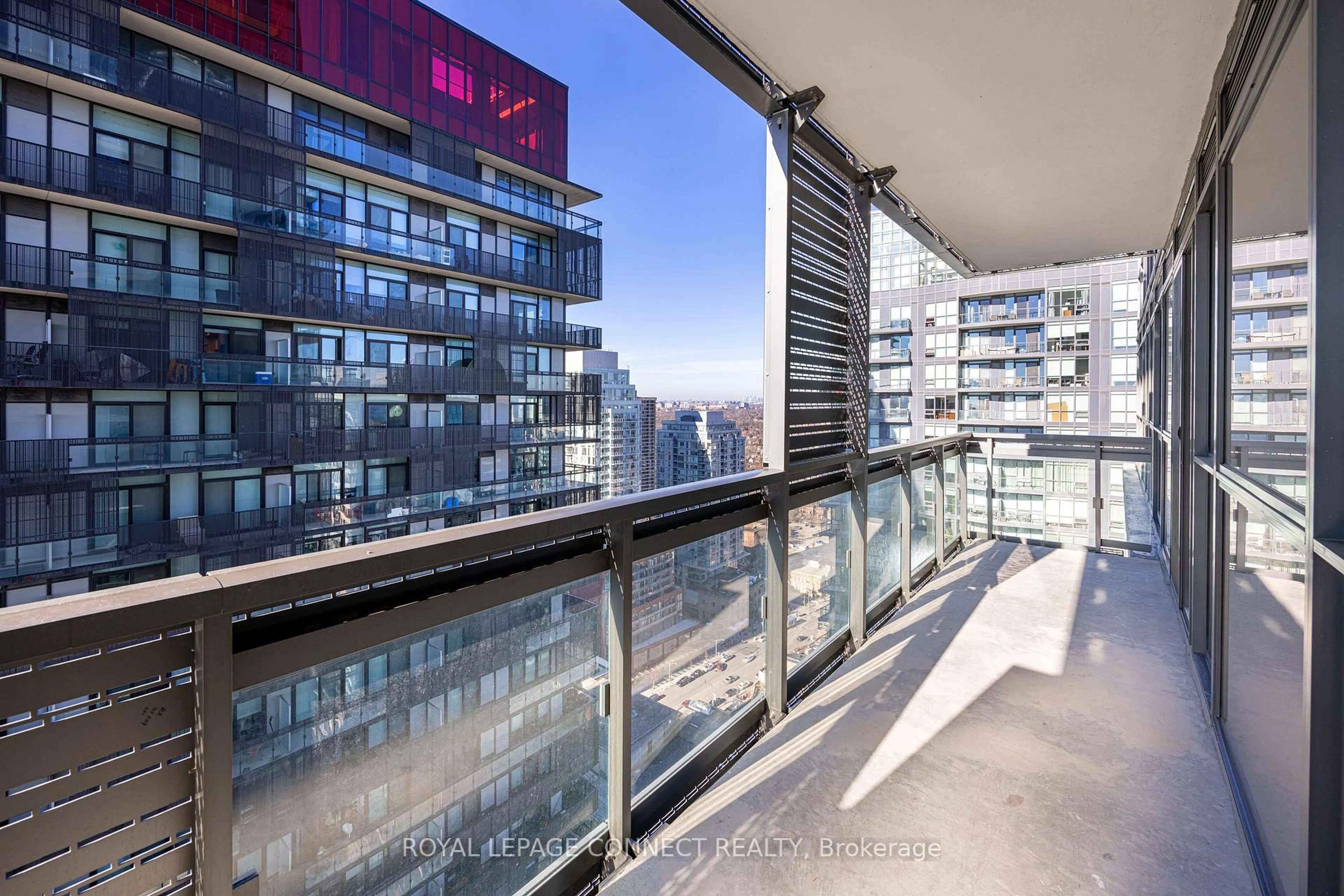 Balcony in the apartment, city buildings view from balcony for 39 Roehampton Ave #2907, Toronto Ontario M4P 0G1