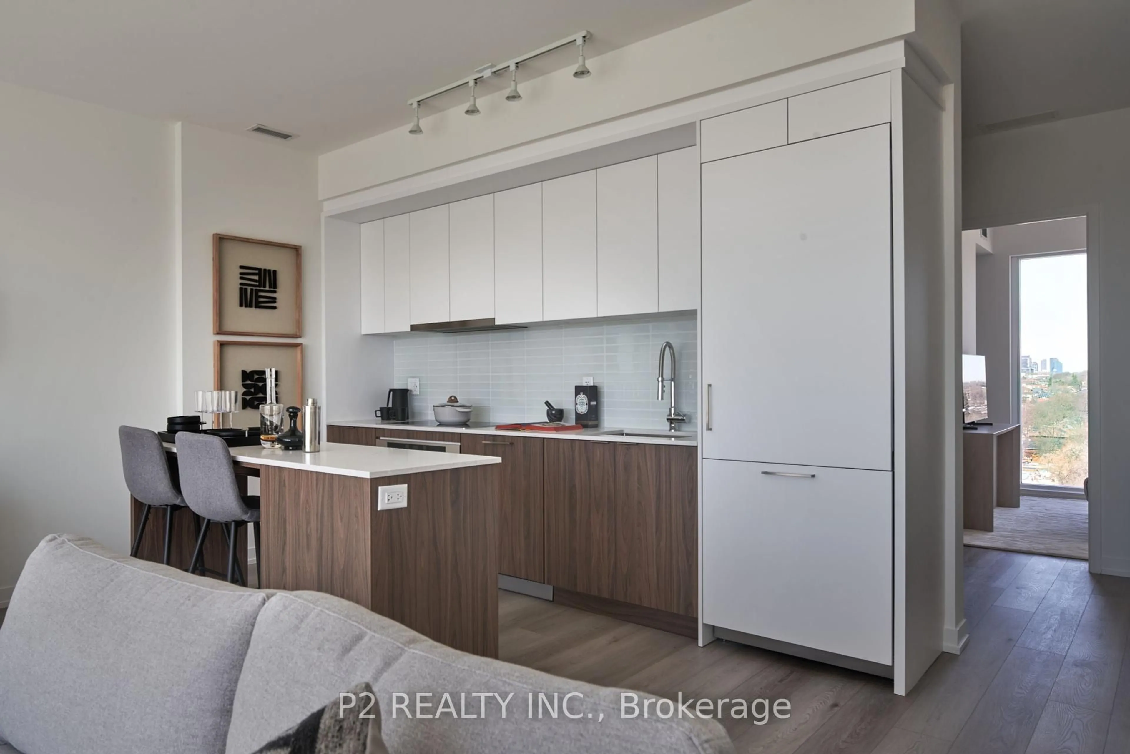 Open concept kitchen, wood/laminate floor for 863 St.Clair Ave #806, Toronto Ontario M6C 1C4