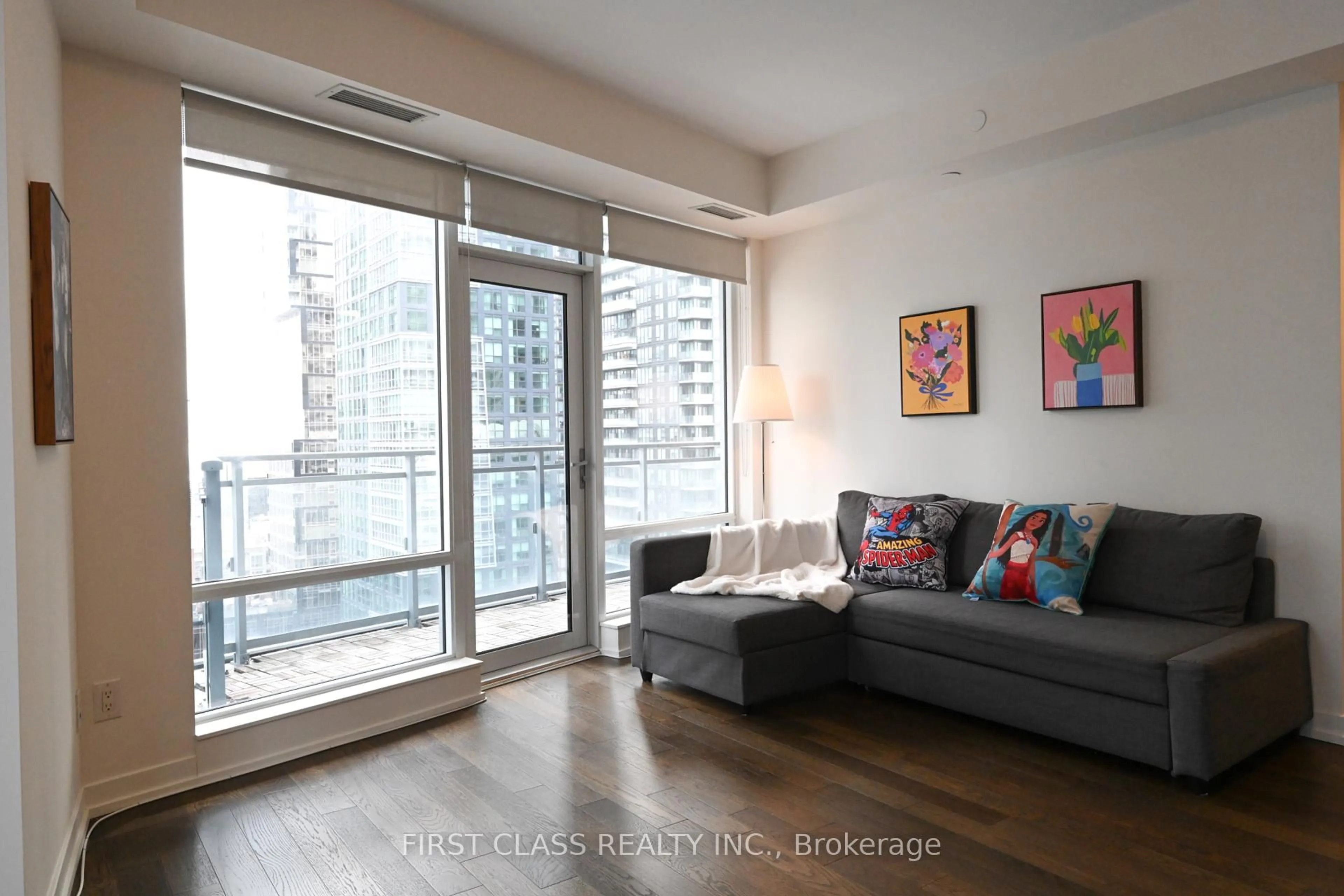 Living room with furniture, wood/laminate floor for 21 Widmer St #2109, Toronto Ontario M5V 2E8