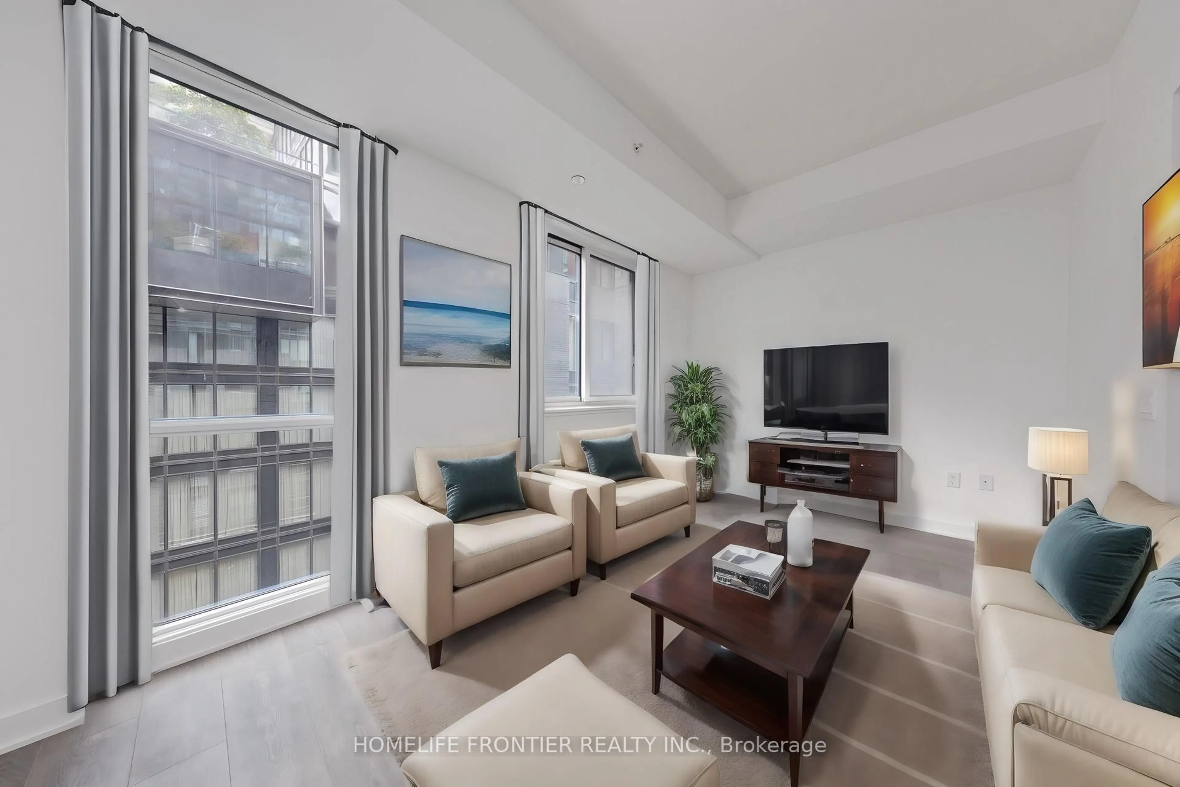 Living room with furniture, unknown for 115 Blue Jays Way #705, Toronto Ontario M5V 0N4