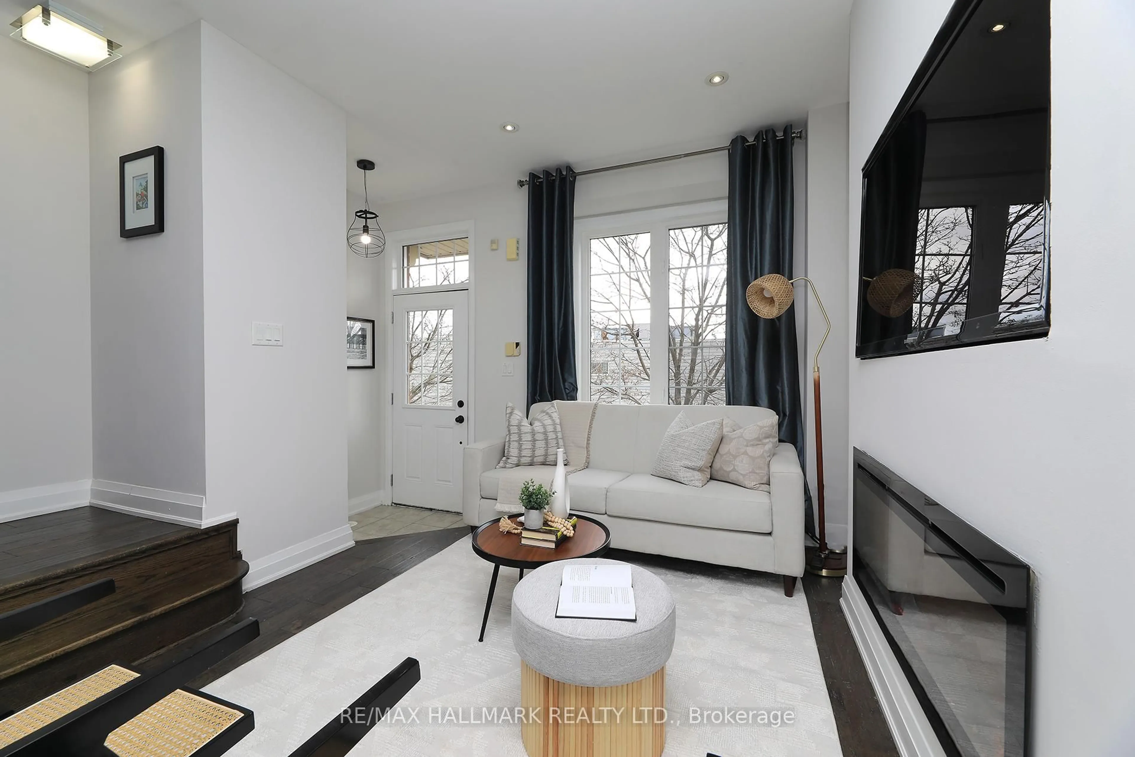Living room with furniture, unknown for 58 Raffeix Lane, Toronto Ontario M5A 0G5