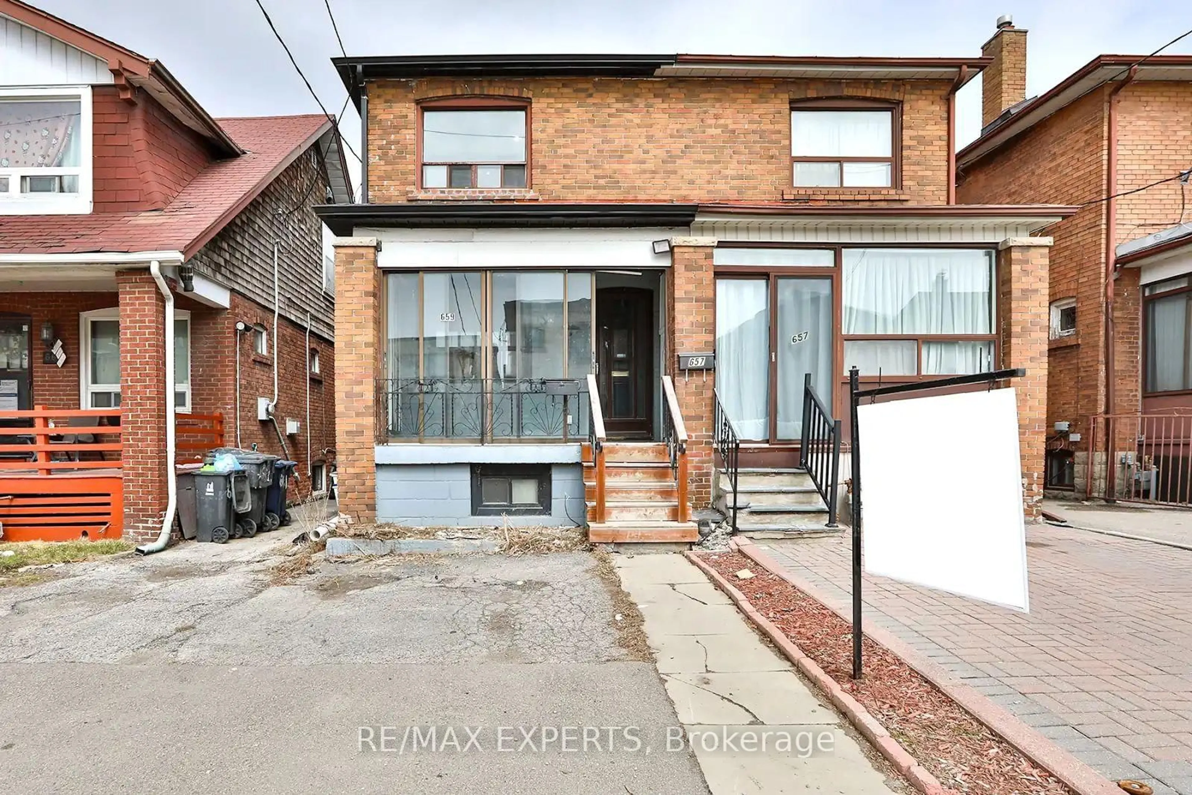 Home with brick exterior material, street for 659 Vaughan Rd, Toronto Ontario M6E 2Y4