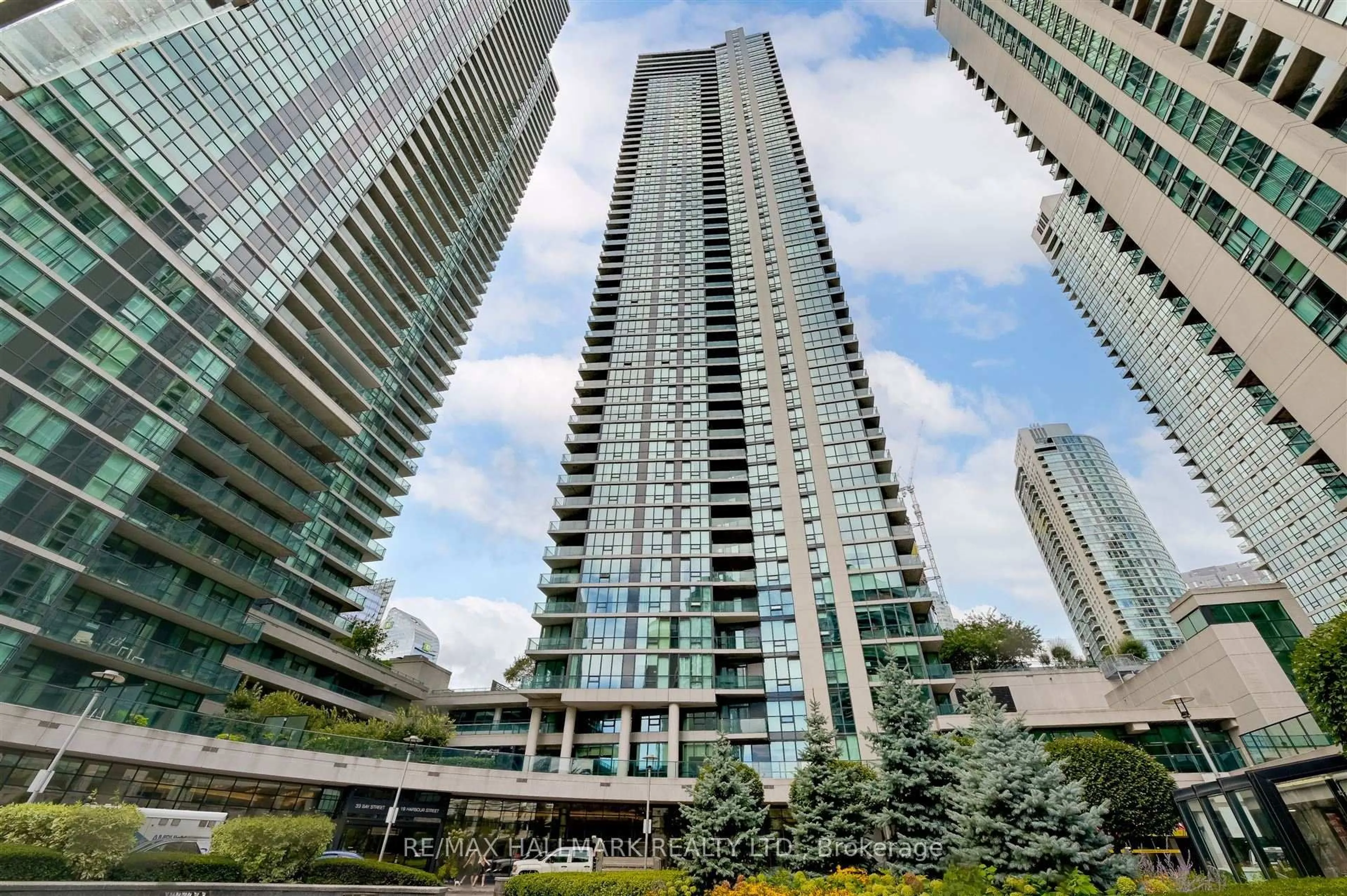 Patio, city buildings view from balcony for 18 Harbour St #1209, Toronto Ontario M5J 2Z6