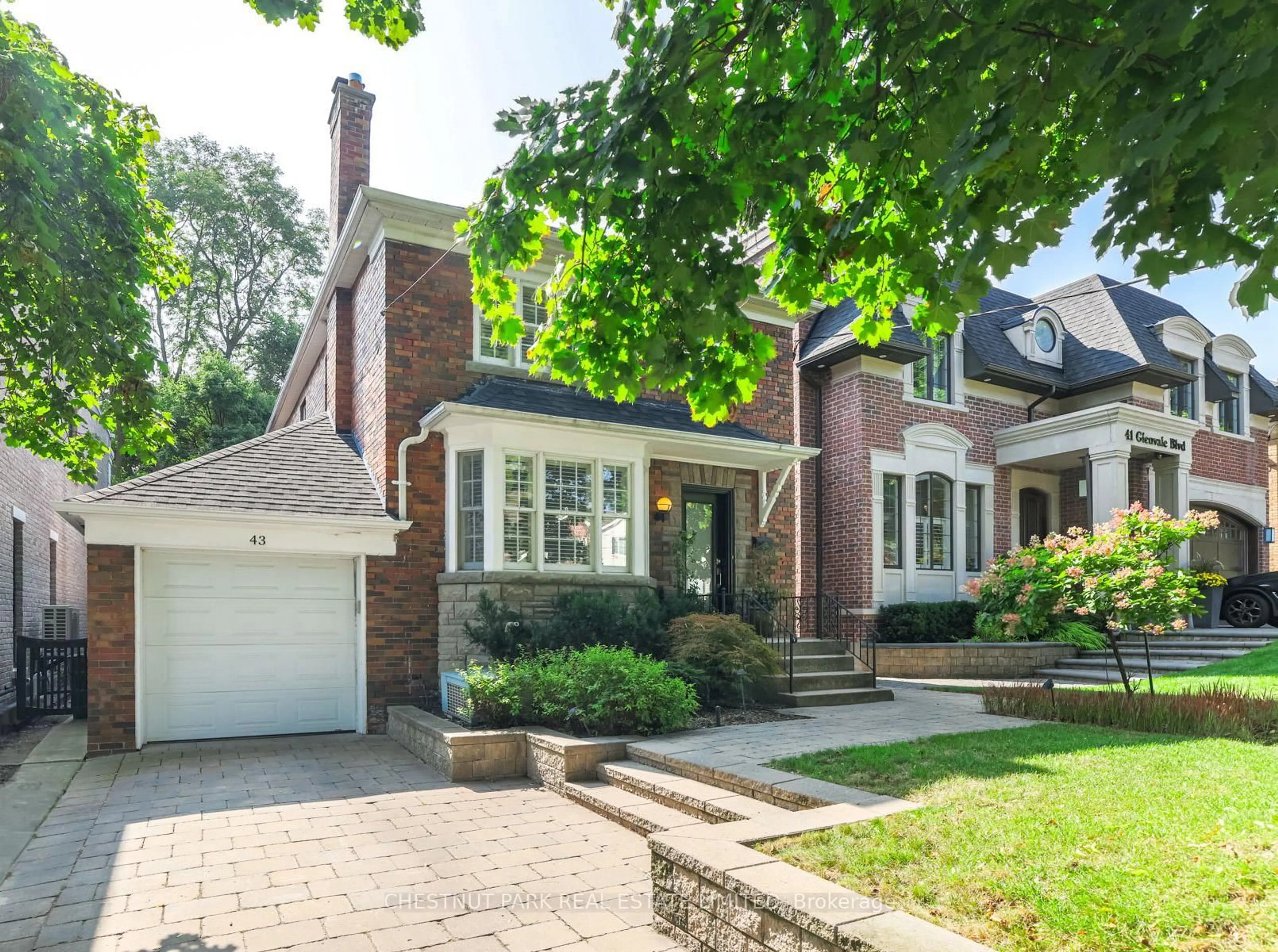 Home with brick exterior material, street for 43 Glenvale Blvd, Toronto Ontario M4G 2V4