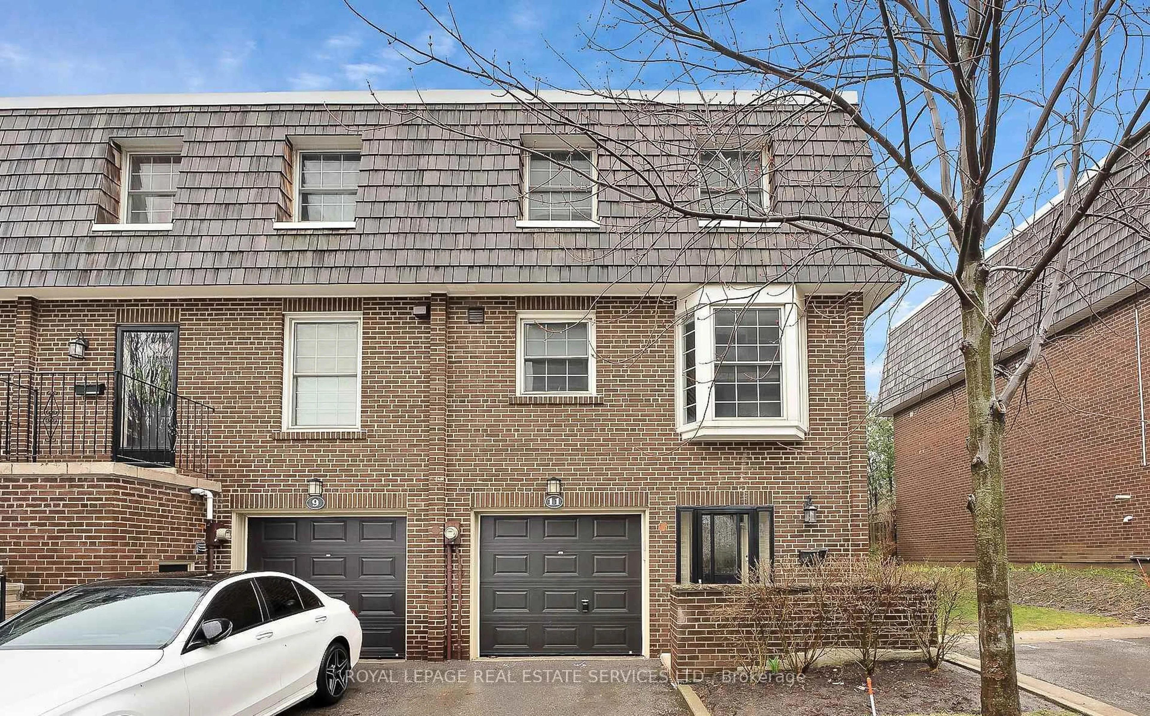Home with brick exterior material, street for 11 Stonedale Plwy #43, Toronto Ontario M3B 1W2