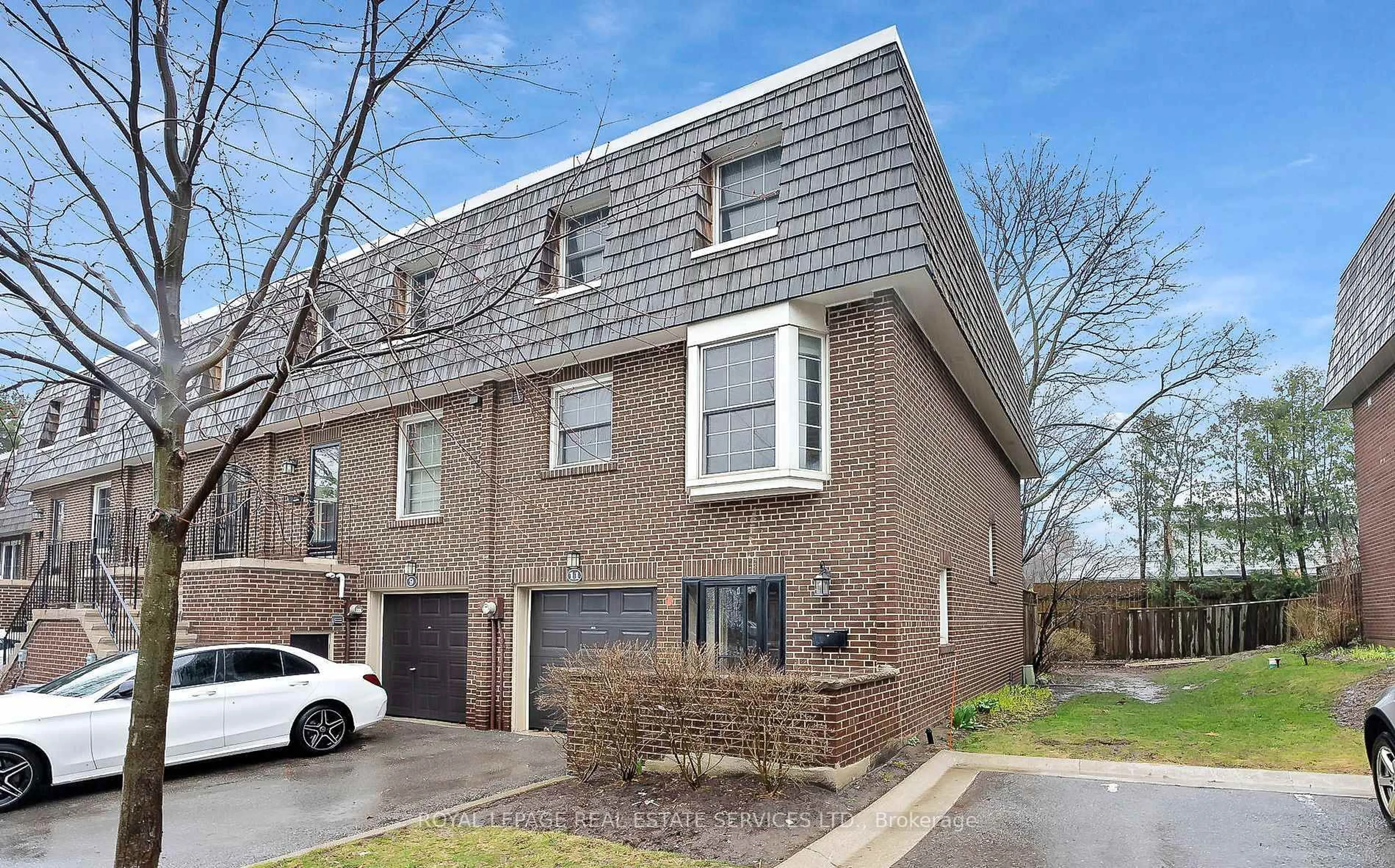 Home with brick exterior material, street for 11 Stonedale Plwy #43, Toronto Ontario M3B 1W2