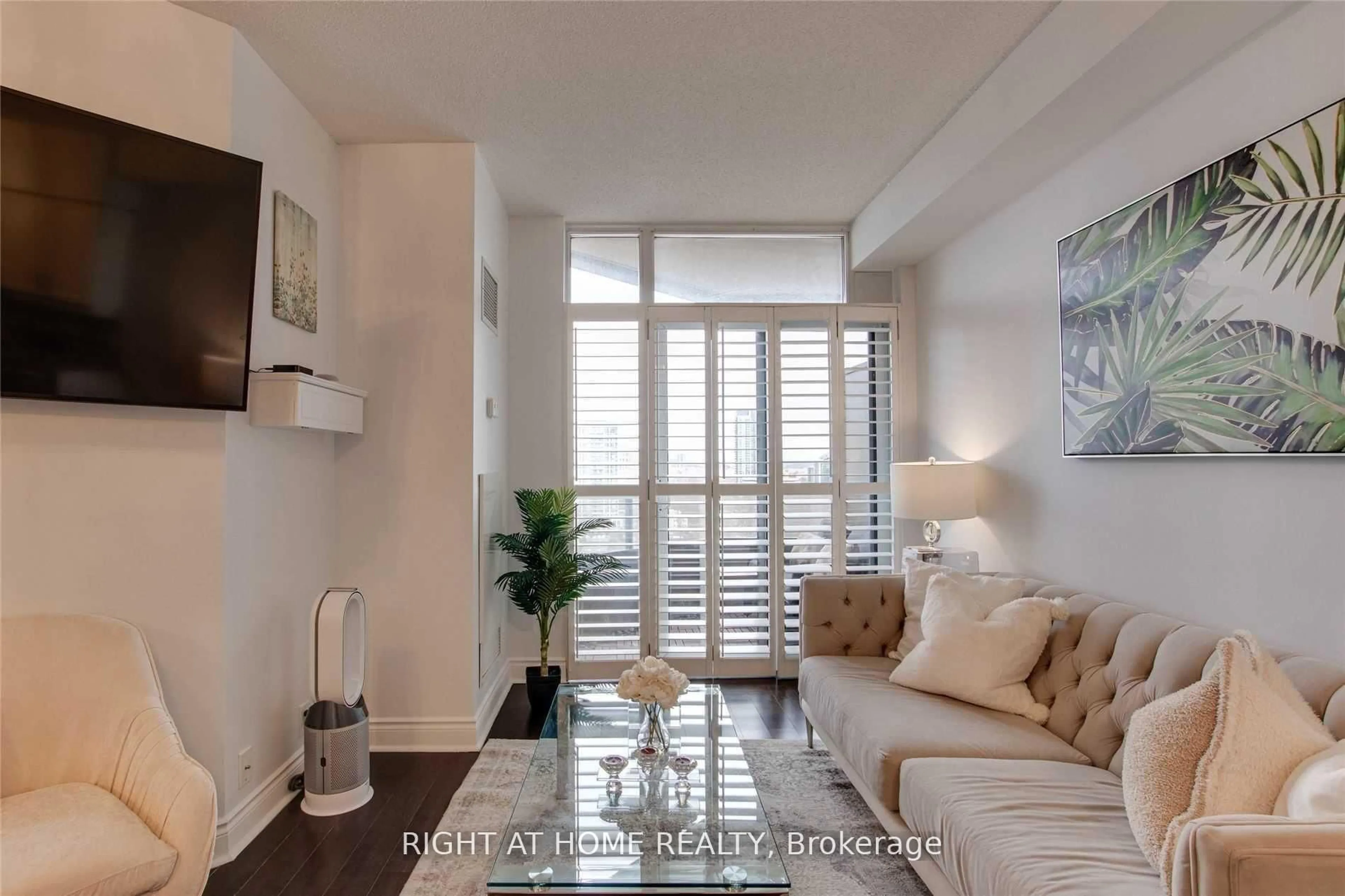 Living room with furniture, wood/laminate floor for 80 Harrison Garden Blvd #1428, Toronto Ontario M2N 7E3