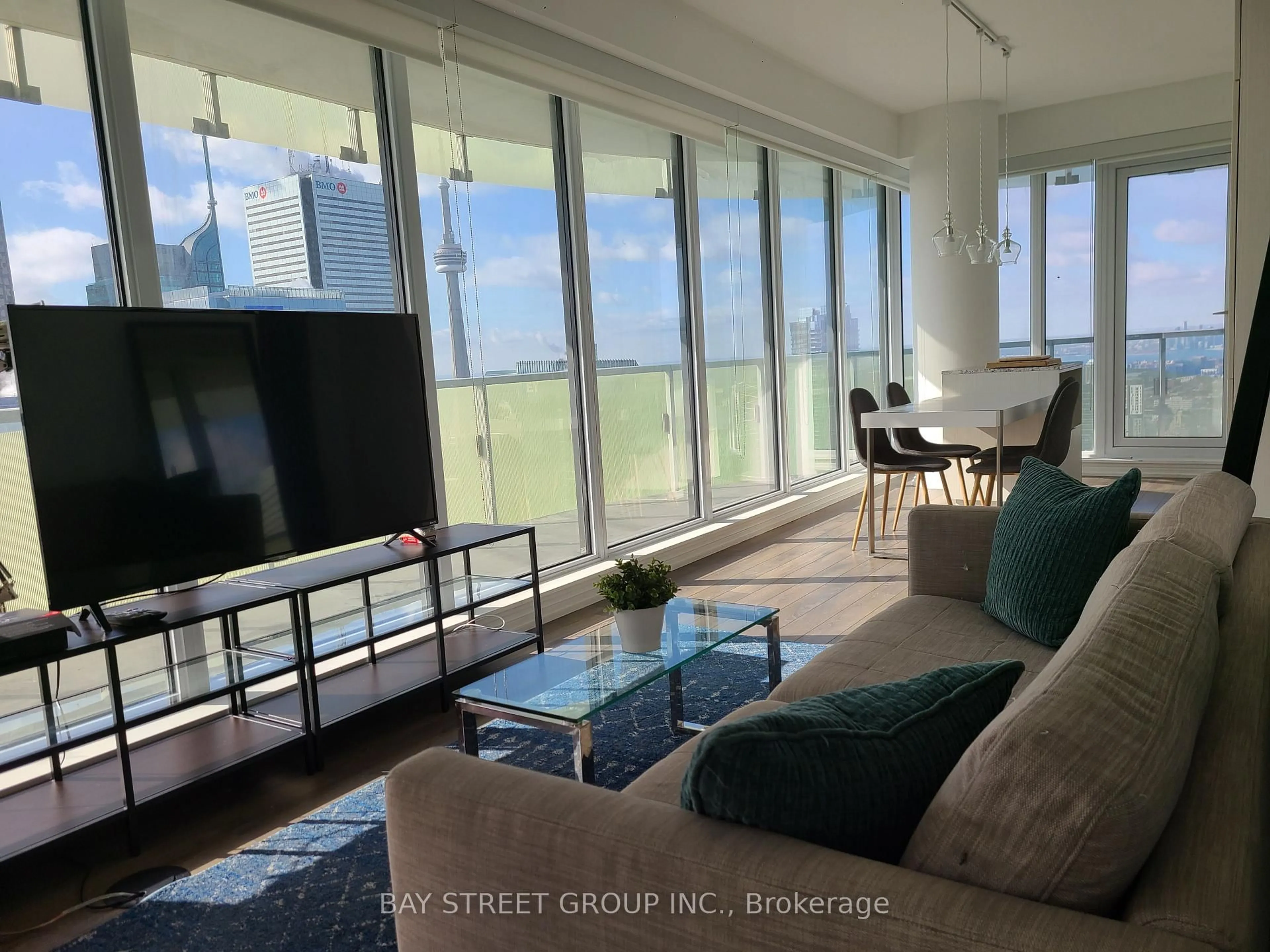 Living room with furniture, unknown for 197 Yonge St #5709, Toronto Ontario M5B 0C1