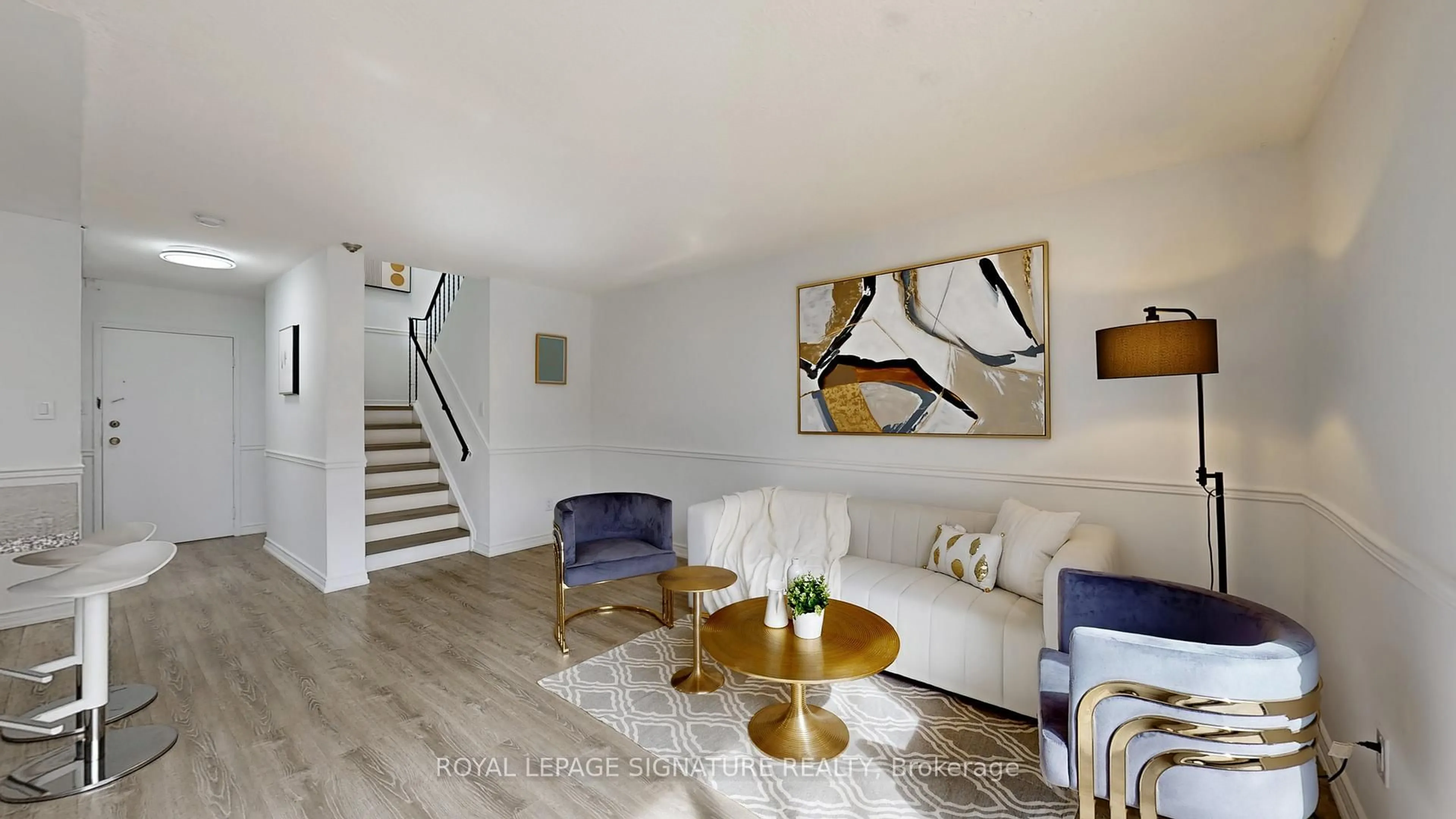 Living room with furniture, wood/laminate floor for 20 Moonstone Bywy #180, Toronto Ontario M2H 3J4