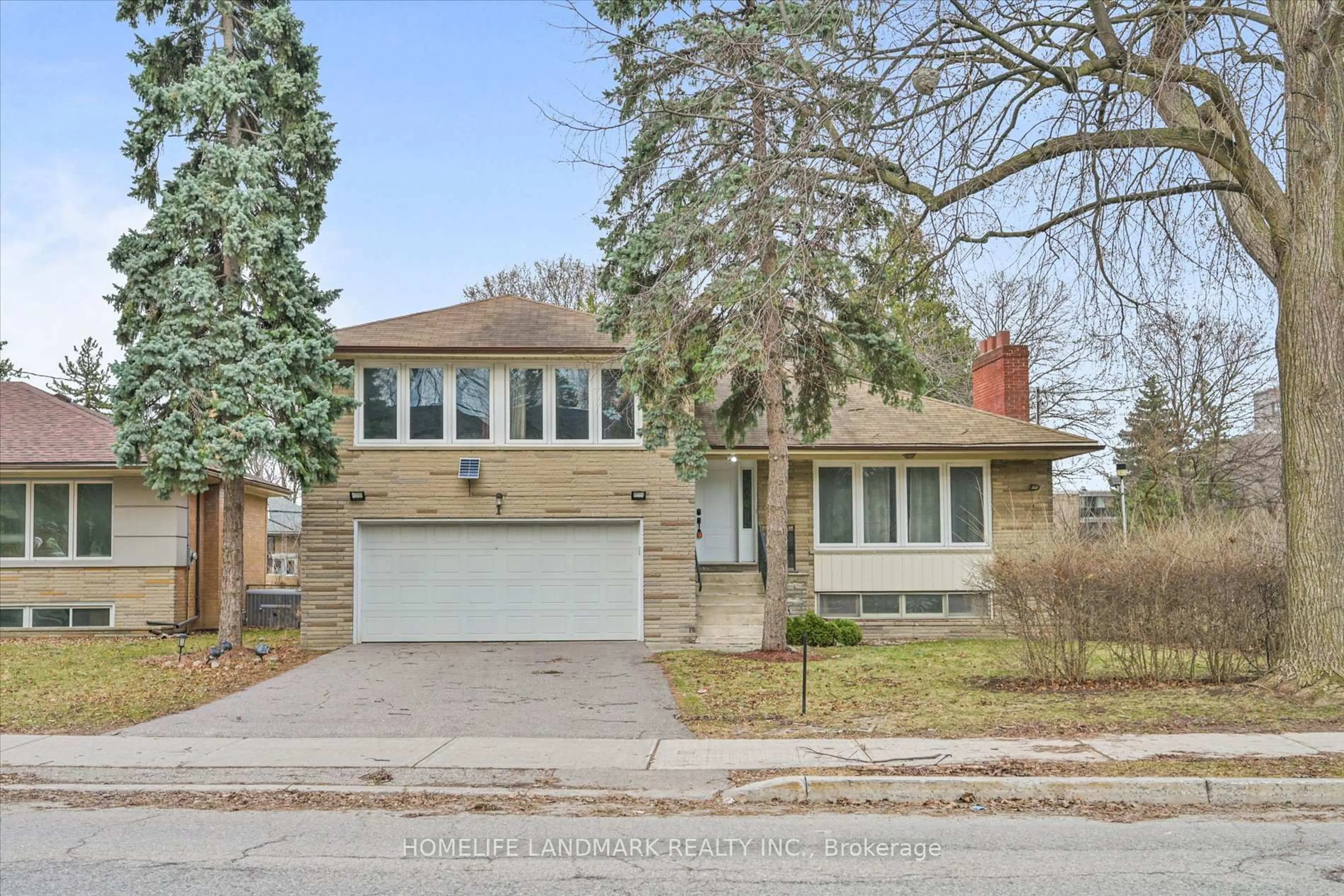 Home with brick exterior material, street for 1 Hawksbury Dr, Toronto Ontario M2K 1M2