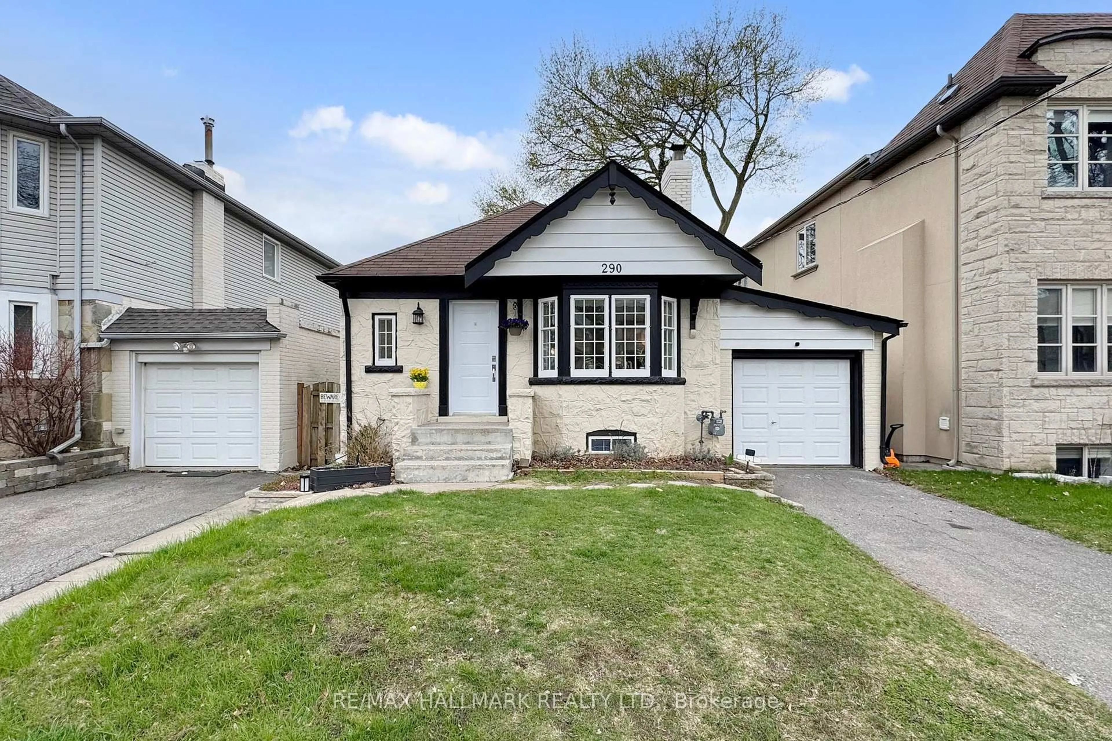 Home with vinyl exterior material, street for 290 Laird Dr, Toronto Ontario M4G 3X5