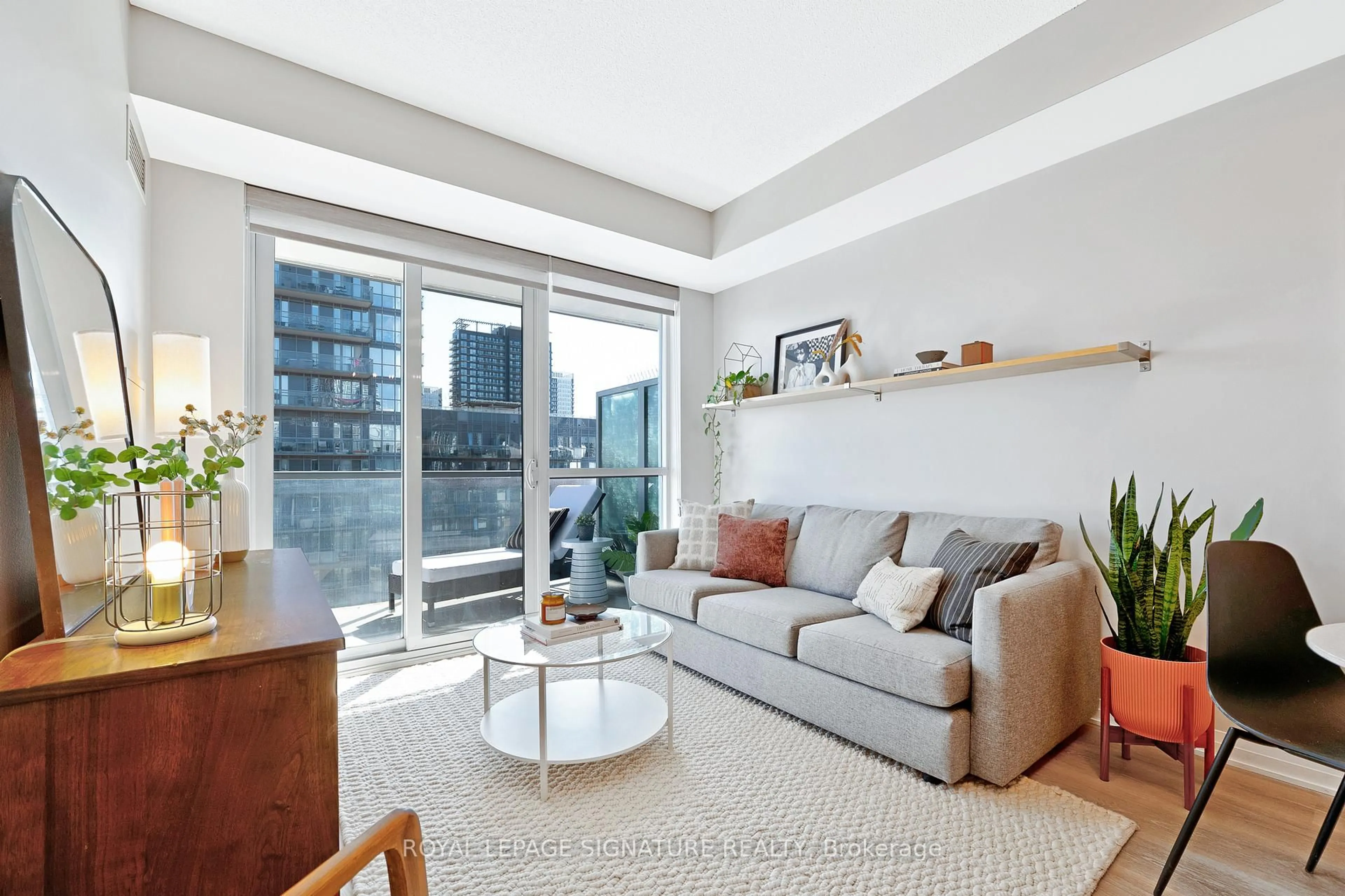 Living room with furniture, unknown for 1 Cole St #804, Toronto Ontario M5A 4M2