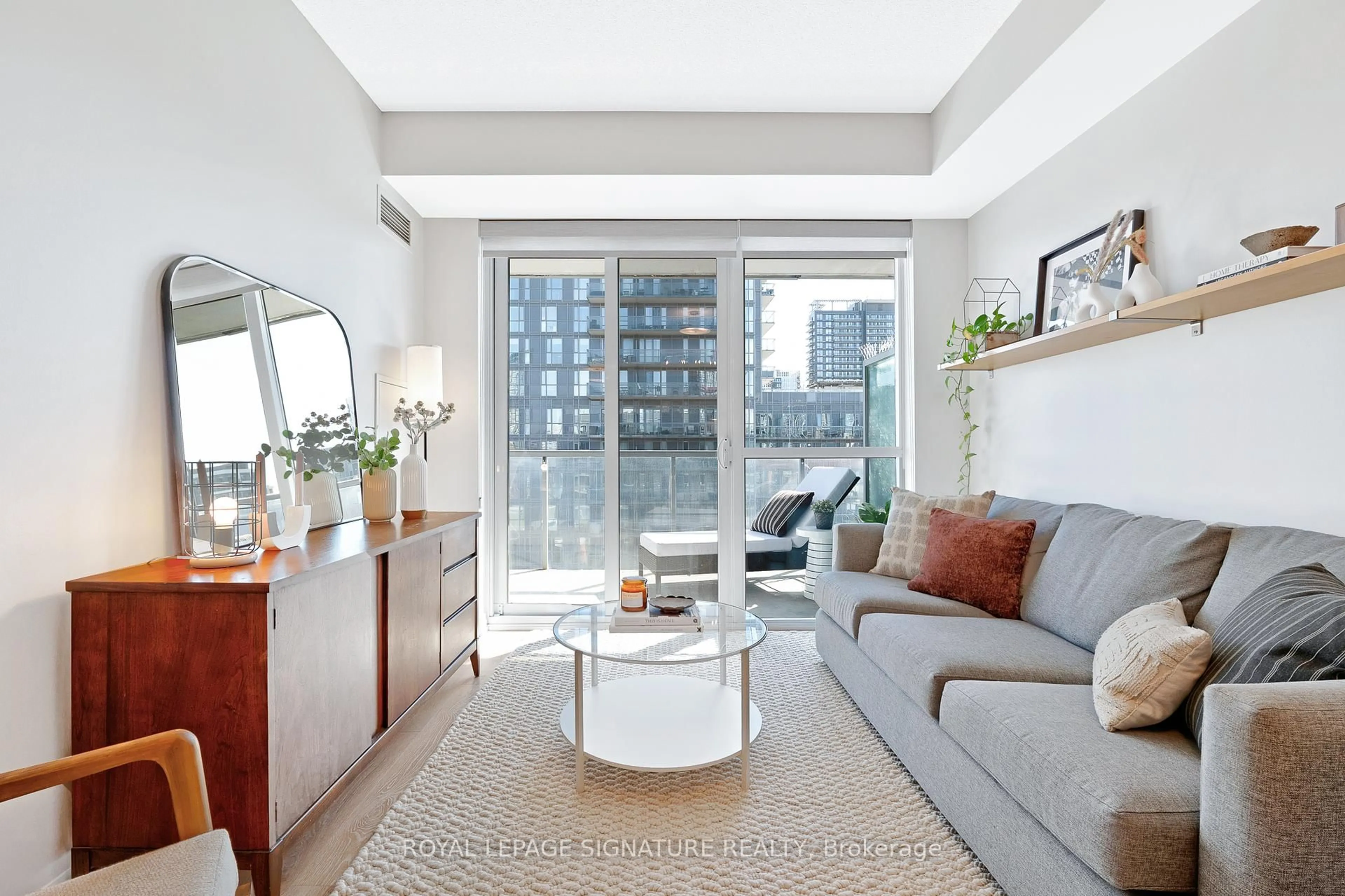 Living room with furniture, unknown for 1 Cole St #804, Toronto Ontario M5A 4M2