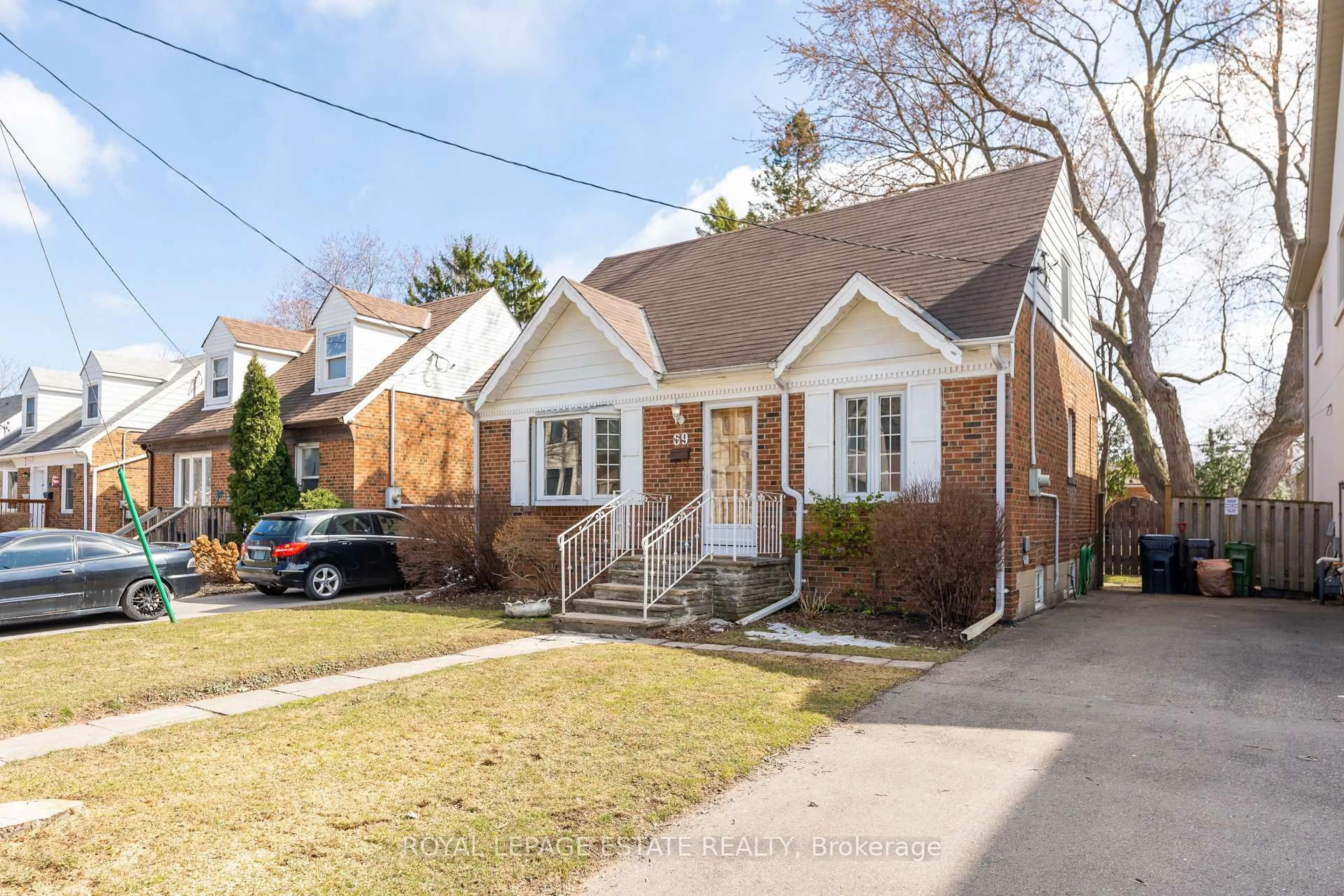 Home with brick exterior material, street for 69 Anndale Dr, Toronto Ontario M2N 2X2