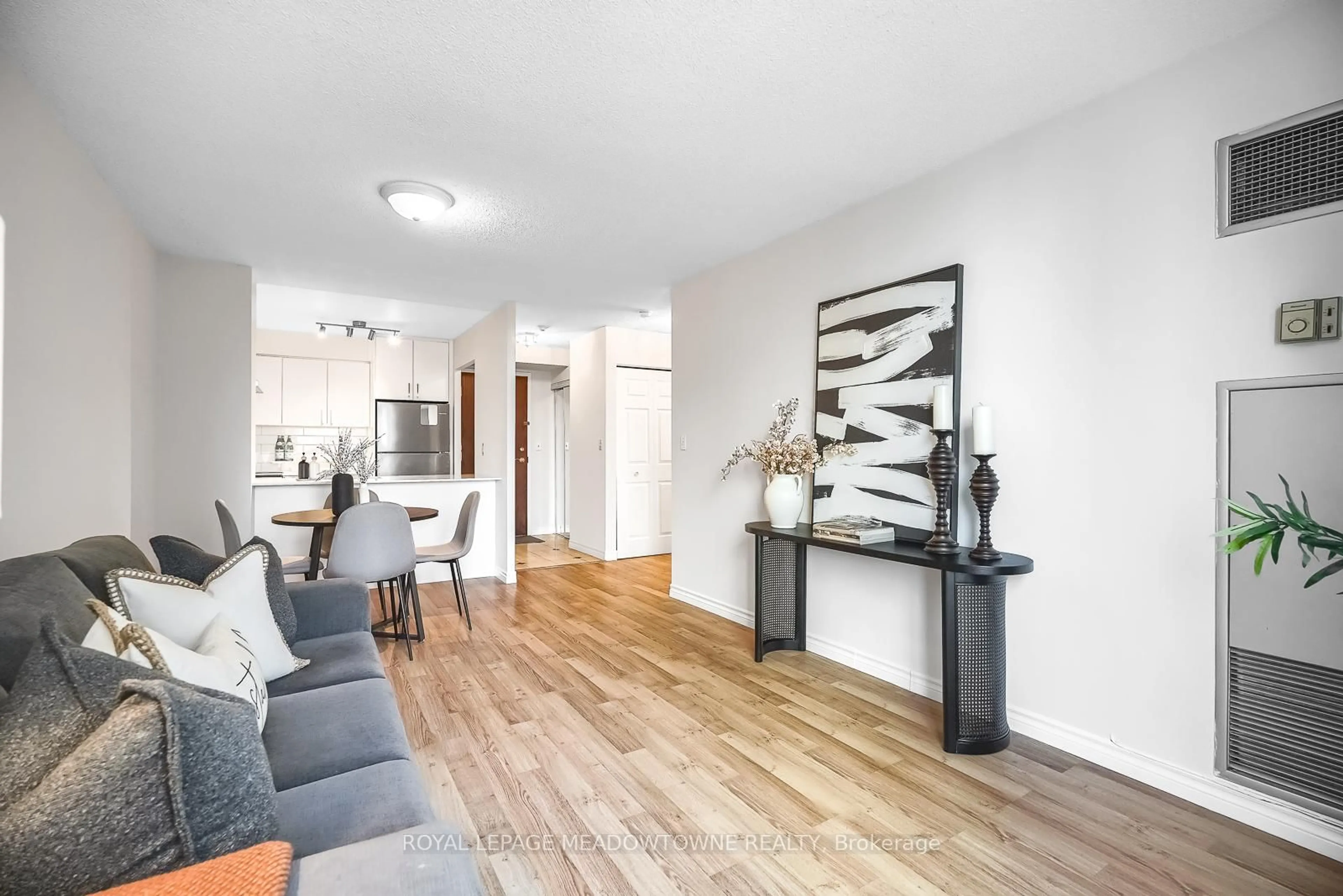 Living room with furniture, wood/laminate floor for 18 Pemberton Ave #401, Toronto Ontario M2M 4K9