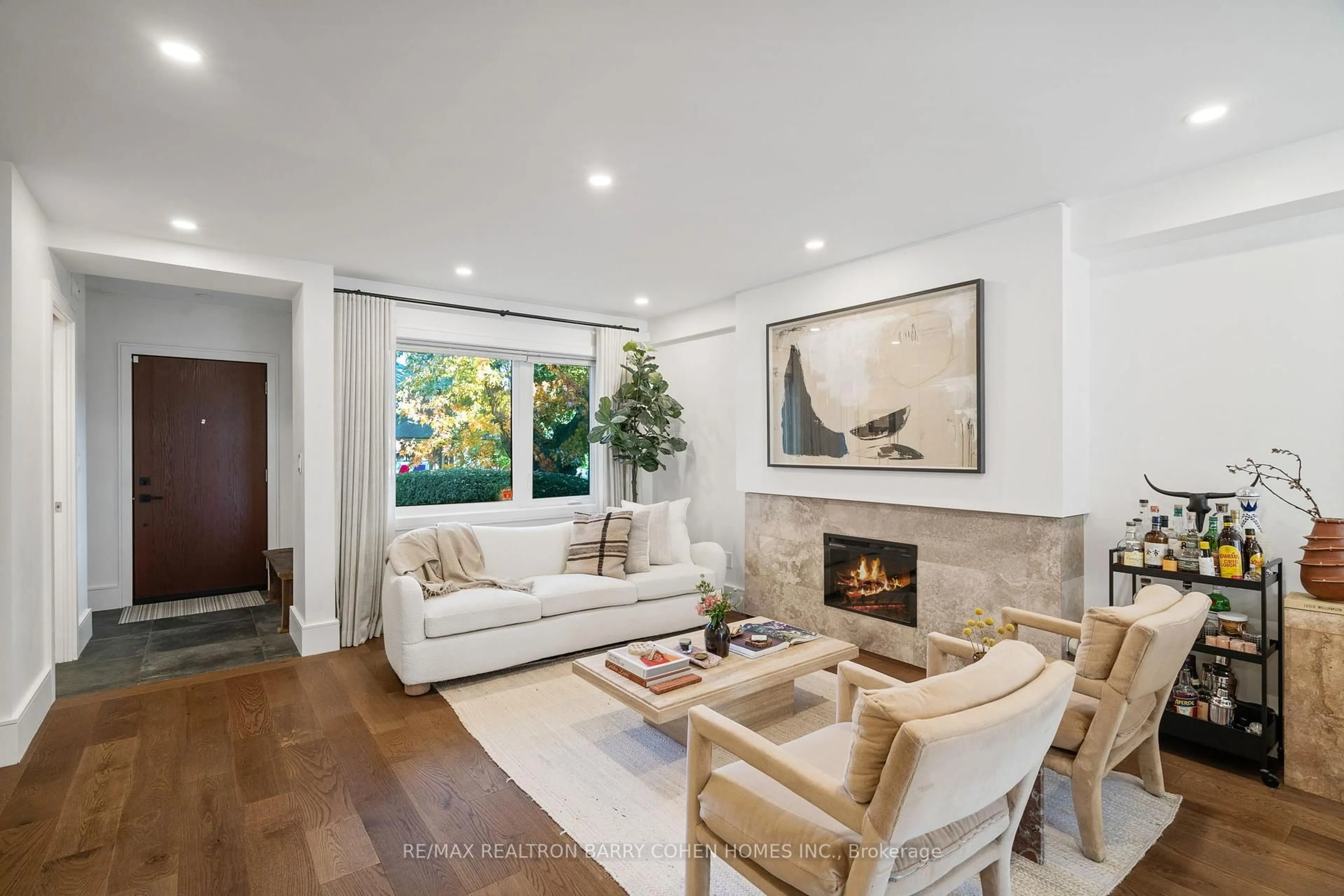 Living room with furniture, ceramic/tile floor for 341 Woburn Ave, Toronto Ontario M5M 1L3