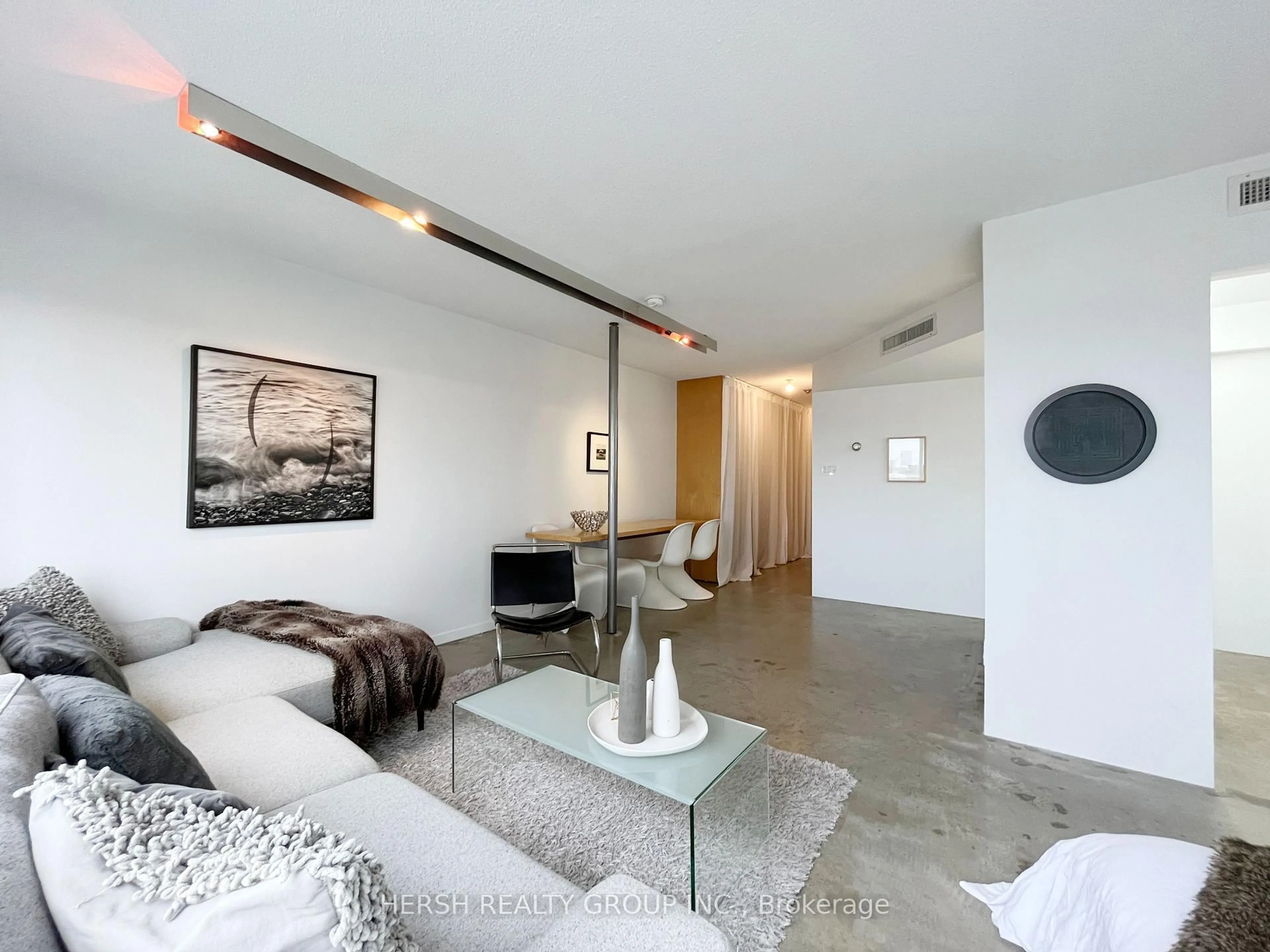 Living room with furniture, cement floor for 1001 Bay St #2316, Toronto Ontario M5S 3A6
