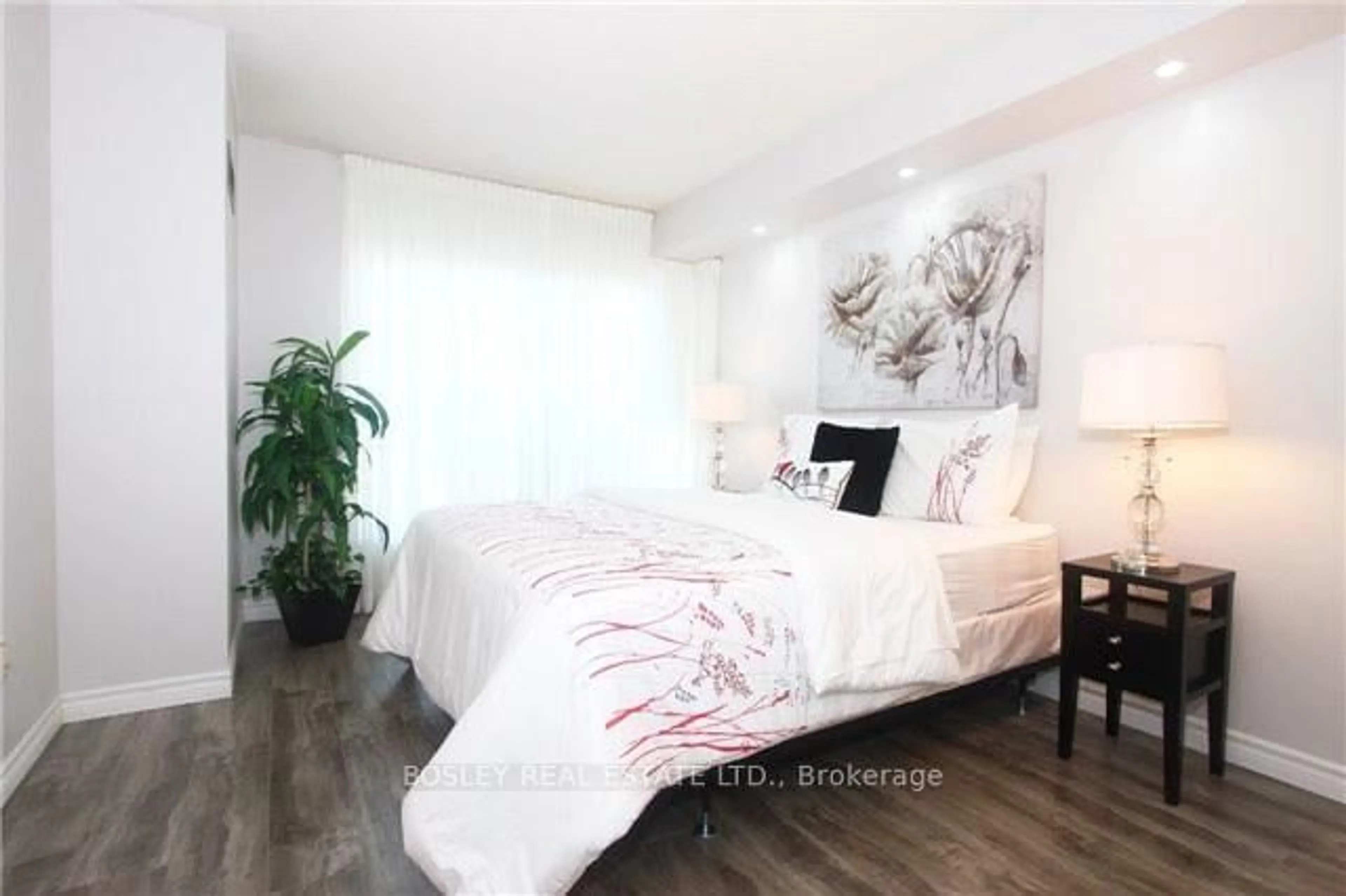 Bedroom with bed, wood/laminate floor for 942 Yonge St #312, Toronto Ontario M4W 3S8