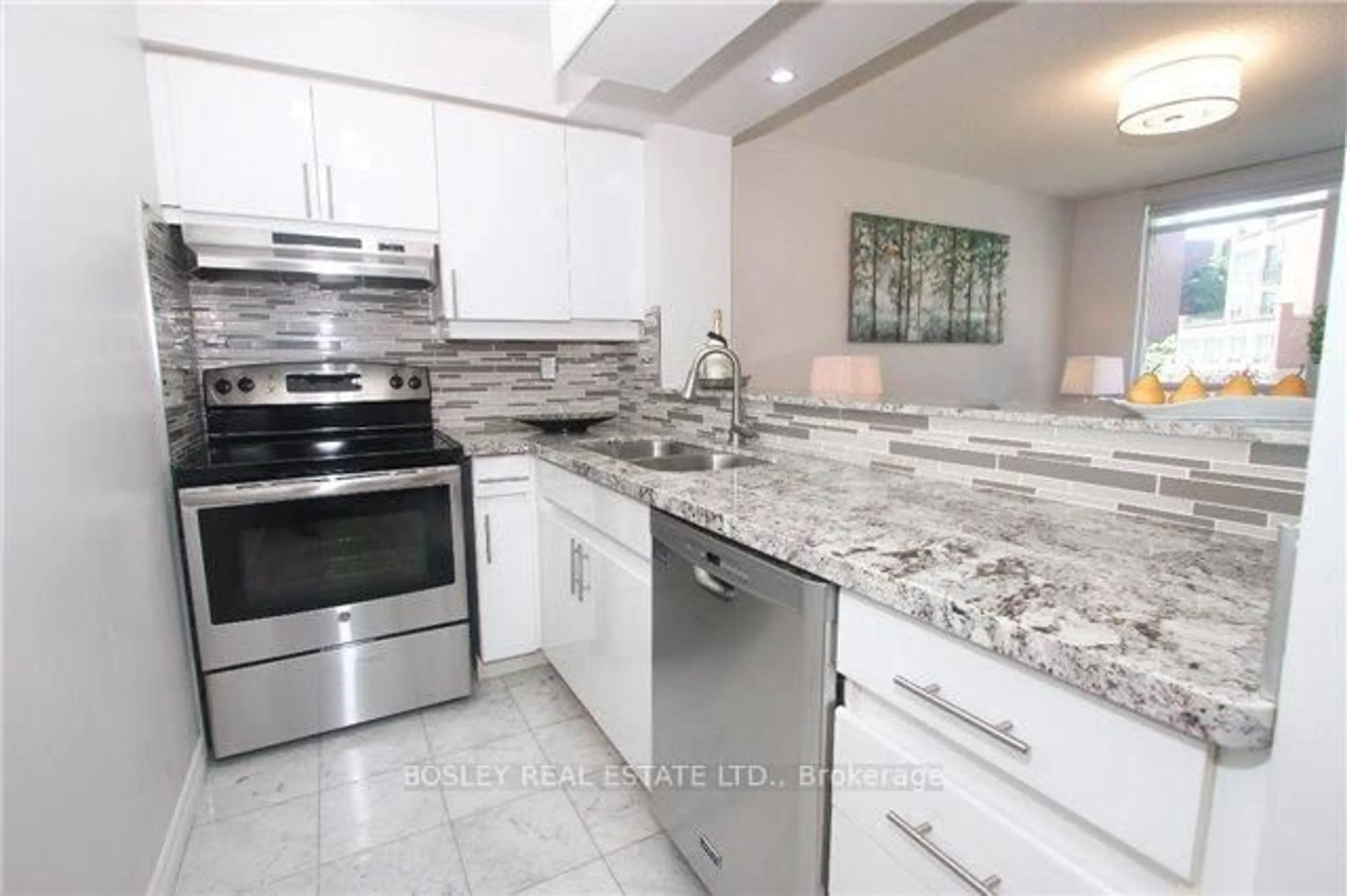 Open concept kitchen, ceramic/tile floor for 942 Yonge St #312, Toronto Ontario M4W 3S8