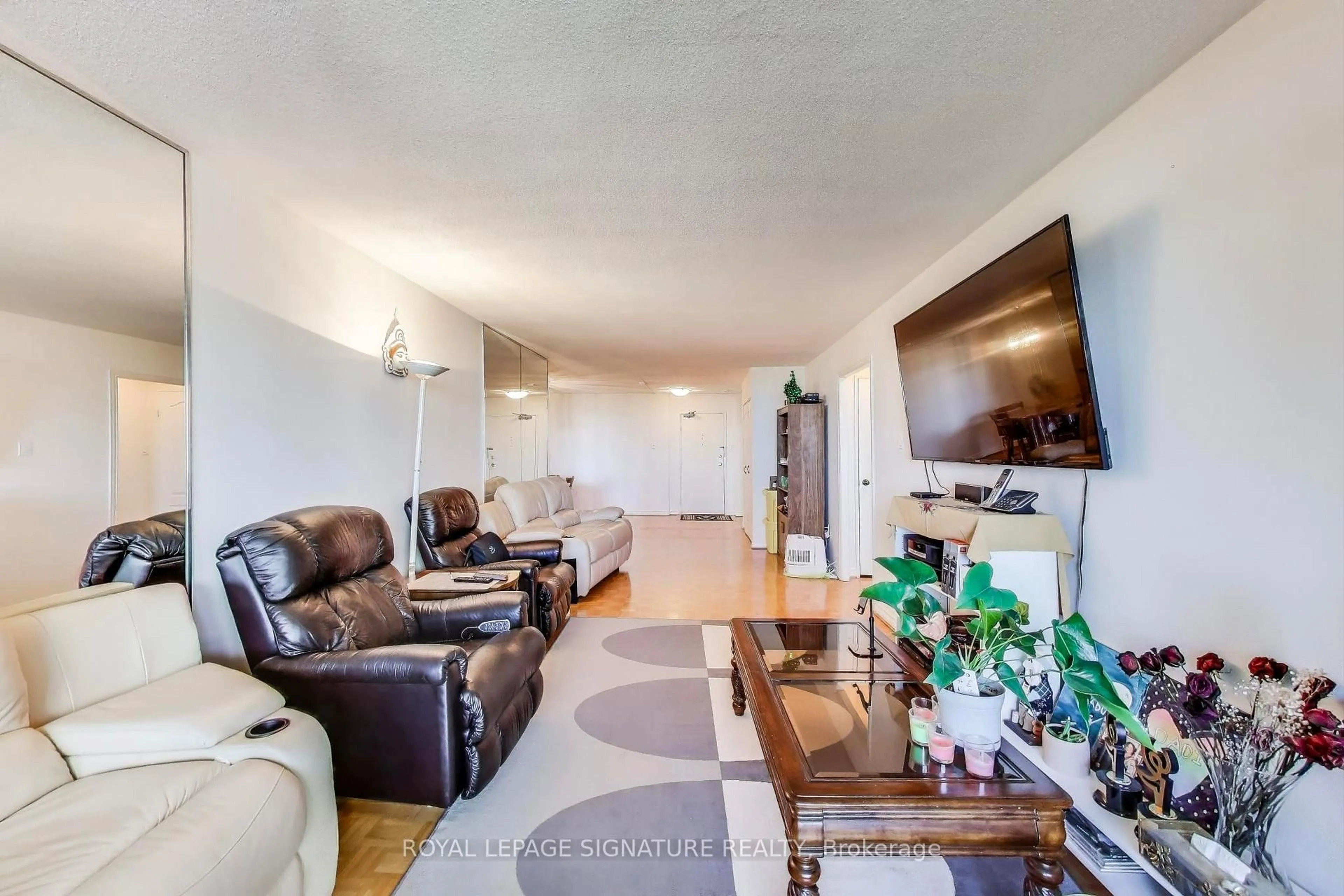 Living room with furniture, unknown for 3303 Don Mills Rd #1205, Toronto Ontario M2J 4T6