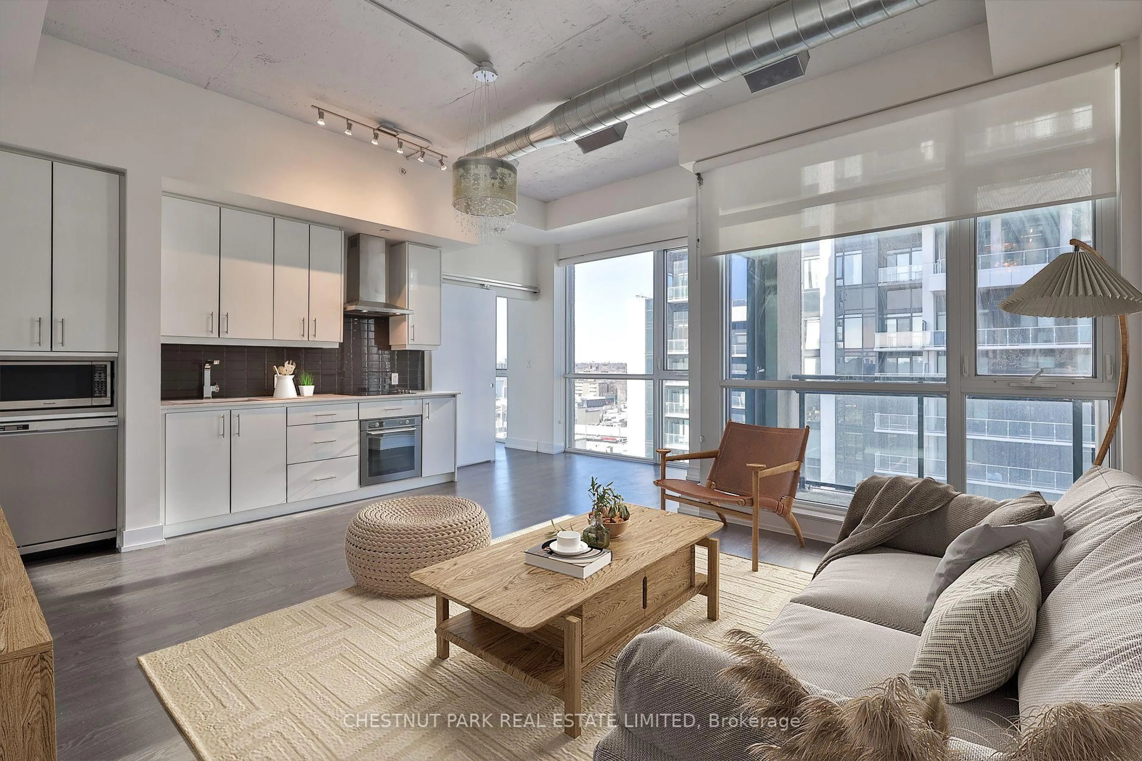Living room with furniture, cement floor for 75 The Donway N/A #603, Toronto Ontario M3C 2E9