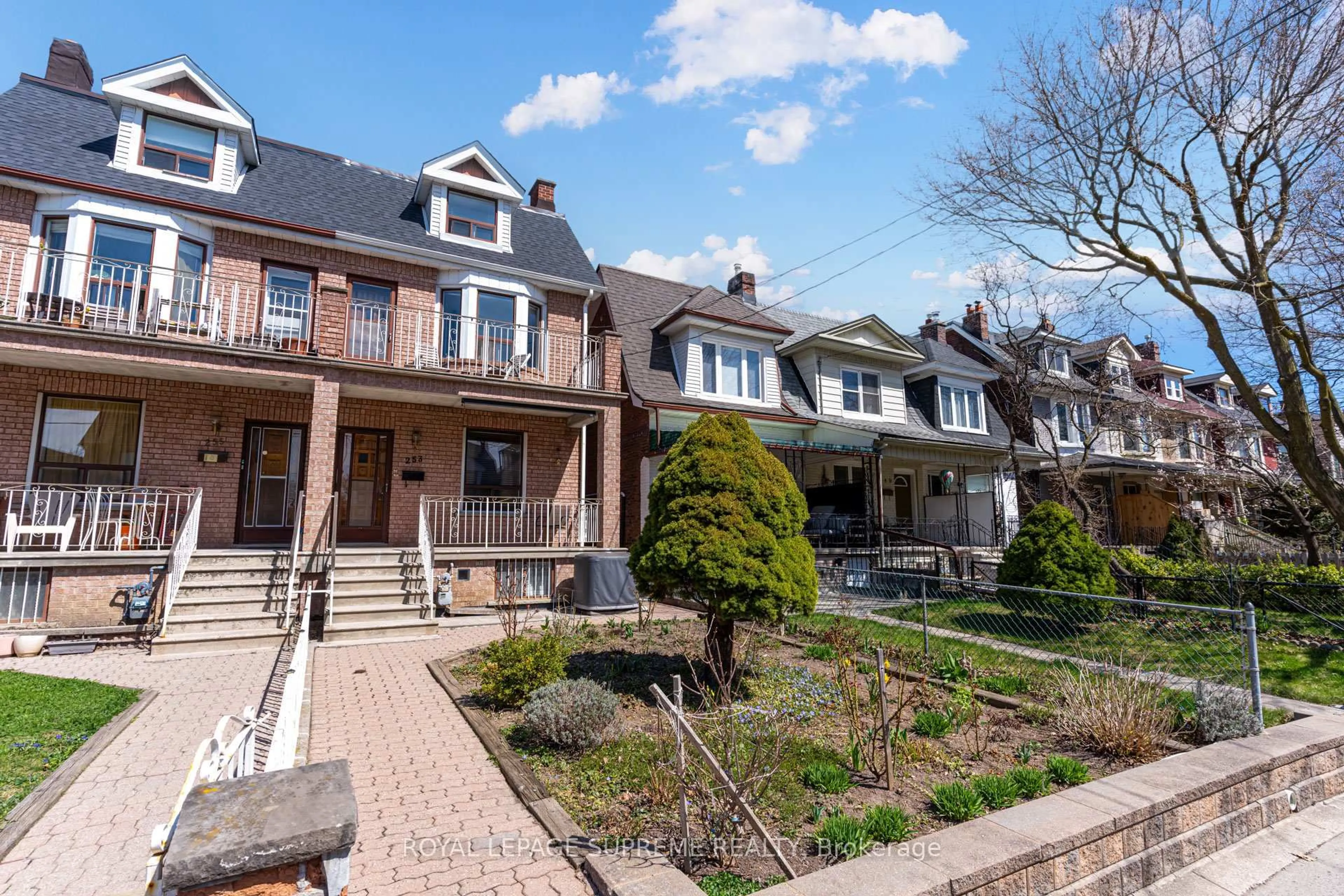 Home with brick exterior material, street for 253 Beatrice St, Toronto Ontario M6G 3E9